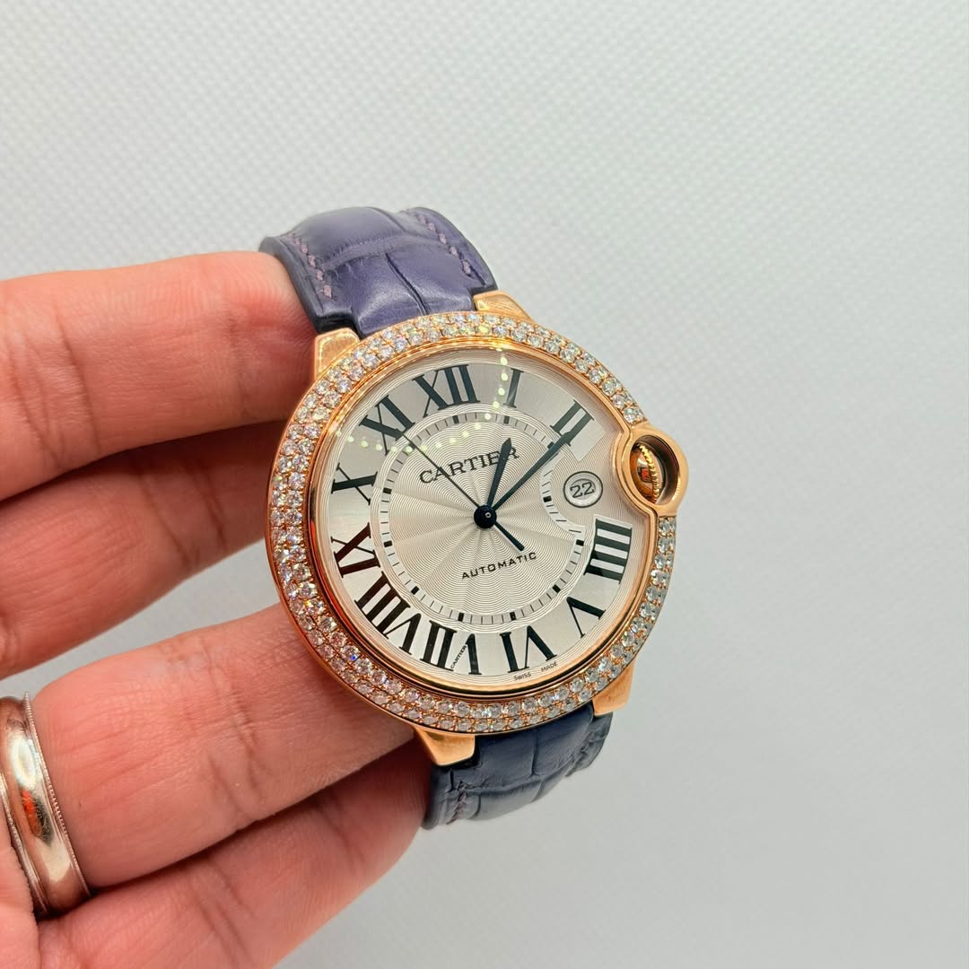 May be an image of wrist watch and text that says 'XLXI VIIAX IX ATIG II 侑 VI'