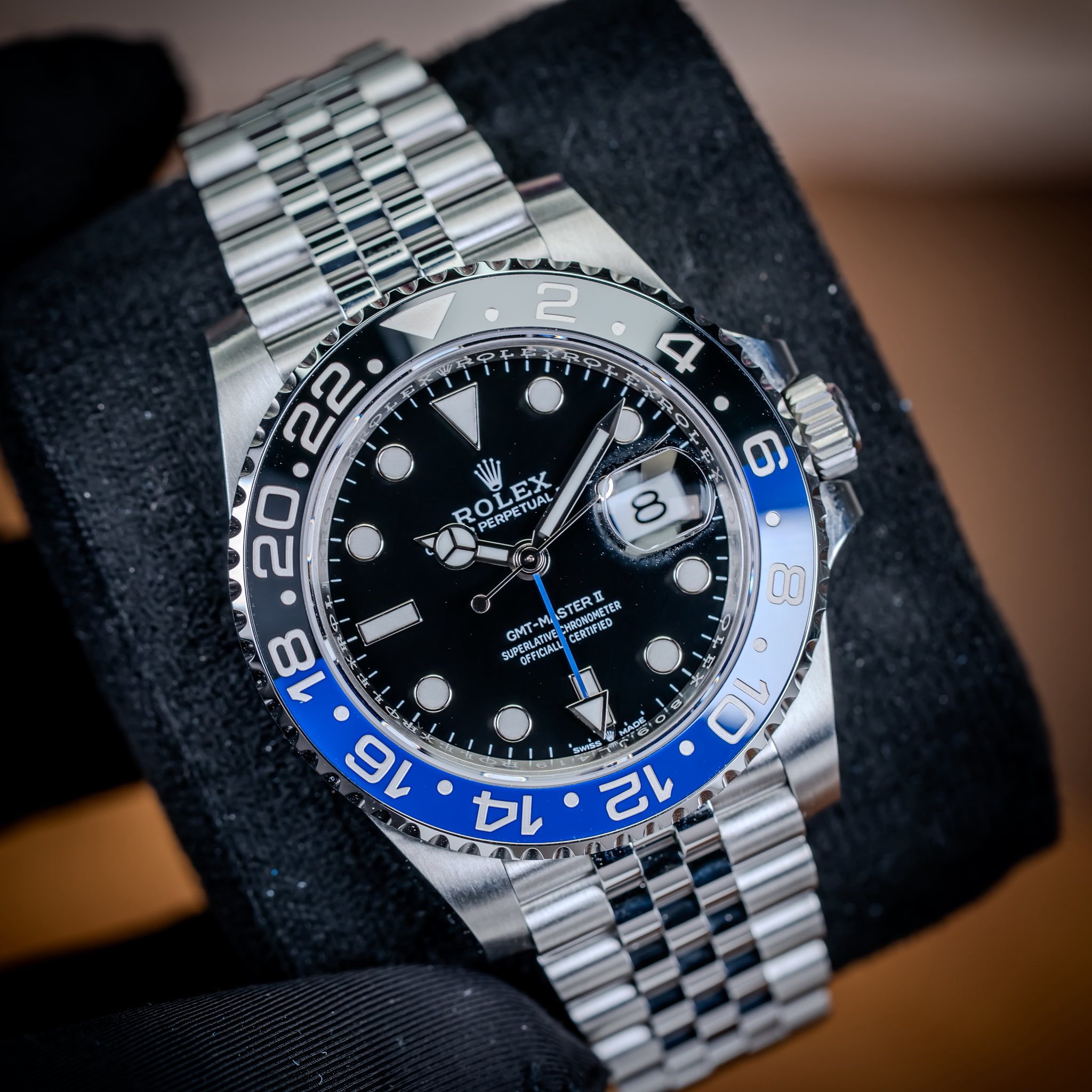 May be an image of wrist watch and text