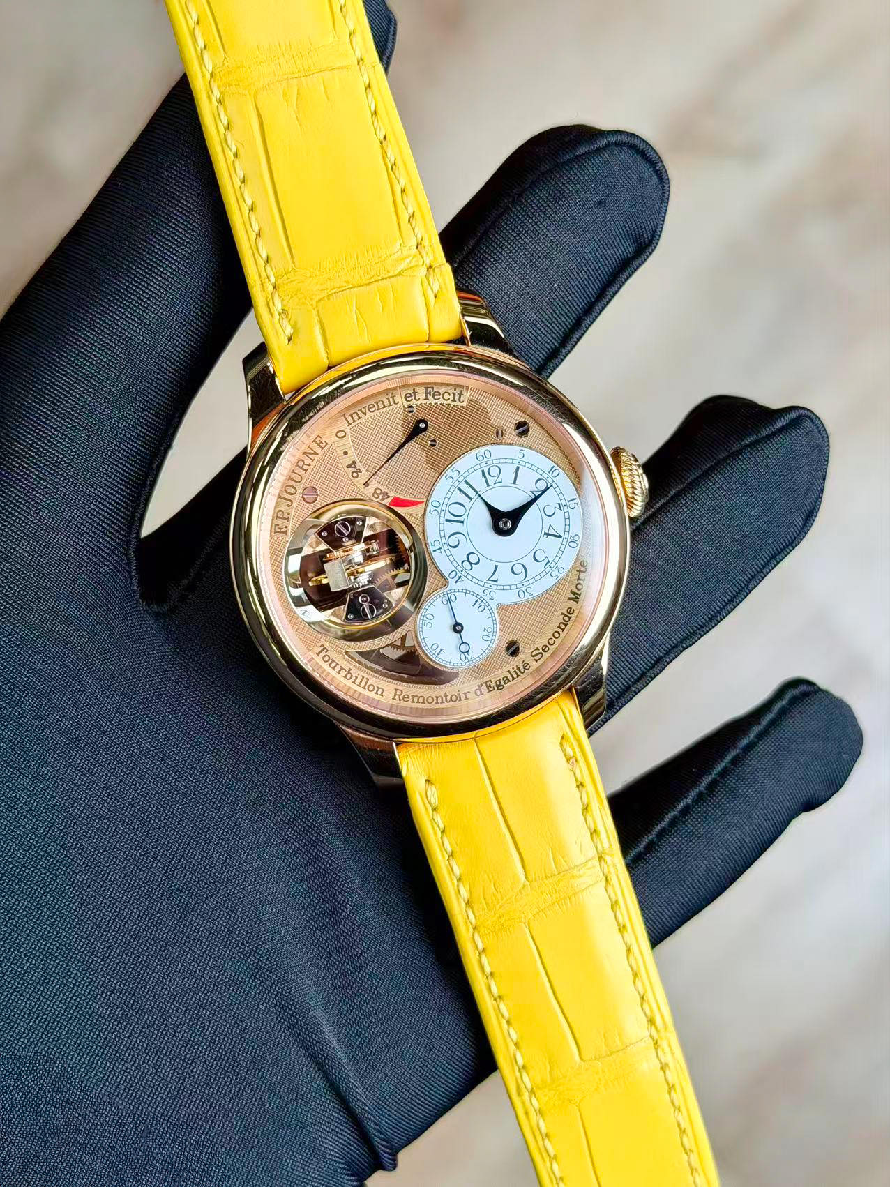 May be an image of wrist watch and text