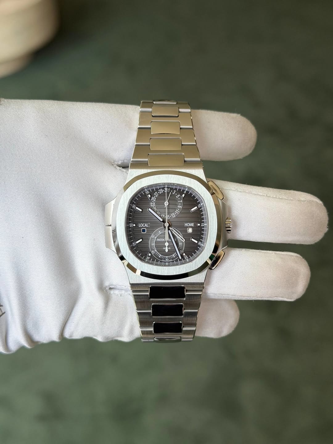 May be an image of wrist watch and text