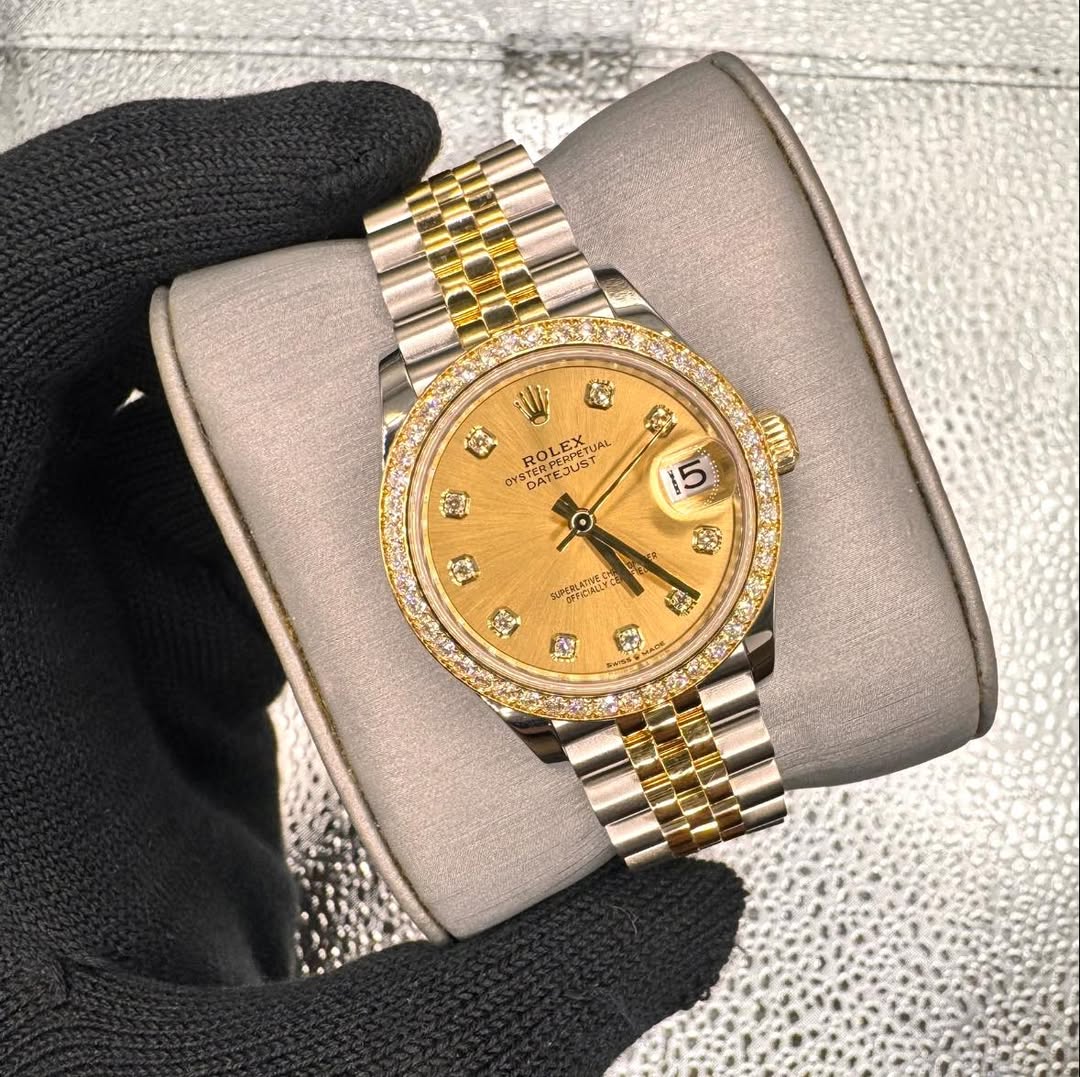 May be an image of wrist watch and text