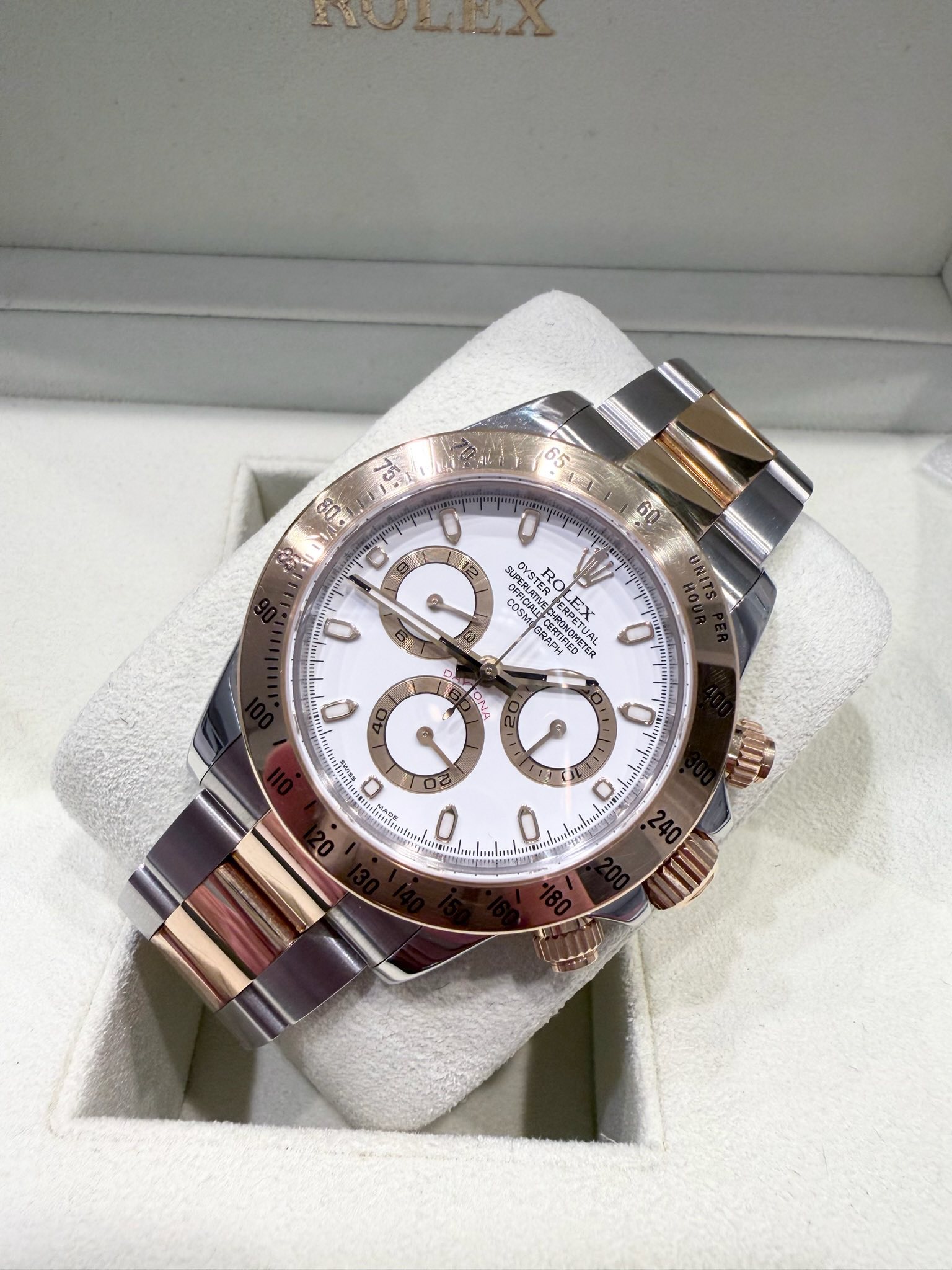 May be an image of wrist watch and text