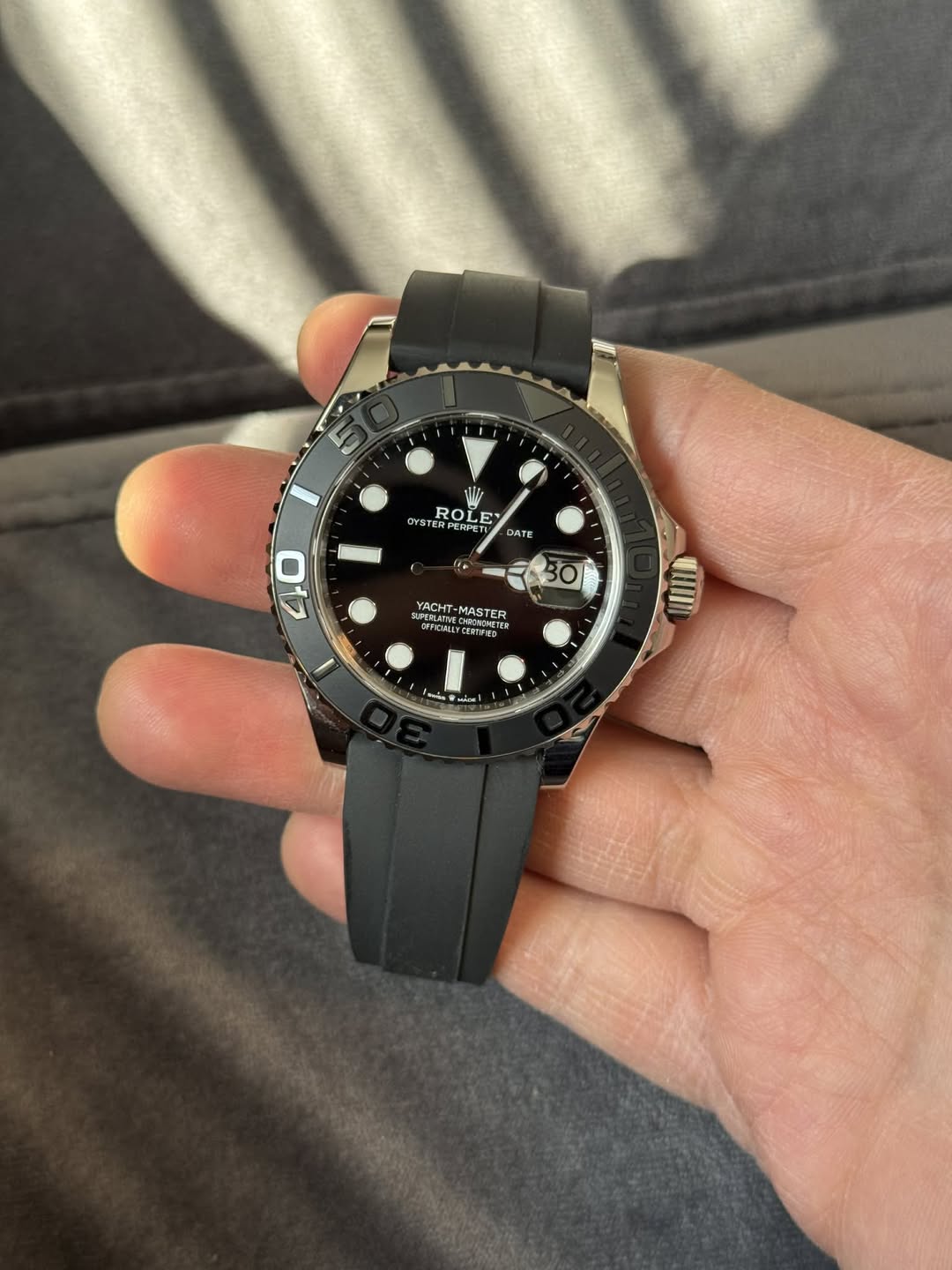 May be an image of wrist watch and text