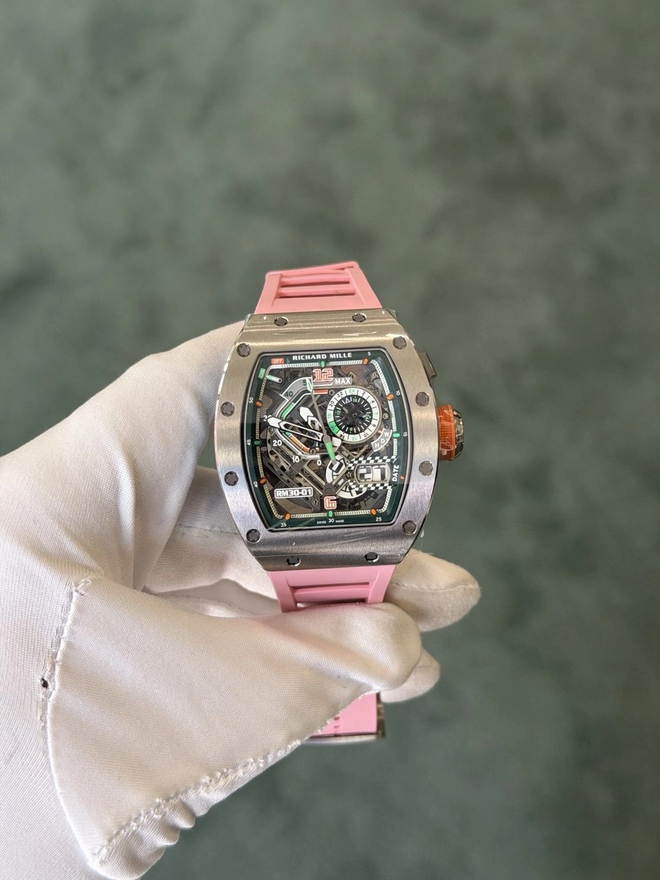 May be an image of wrist watch and text