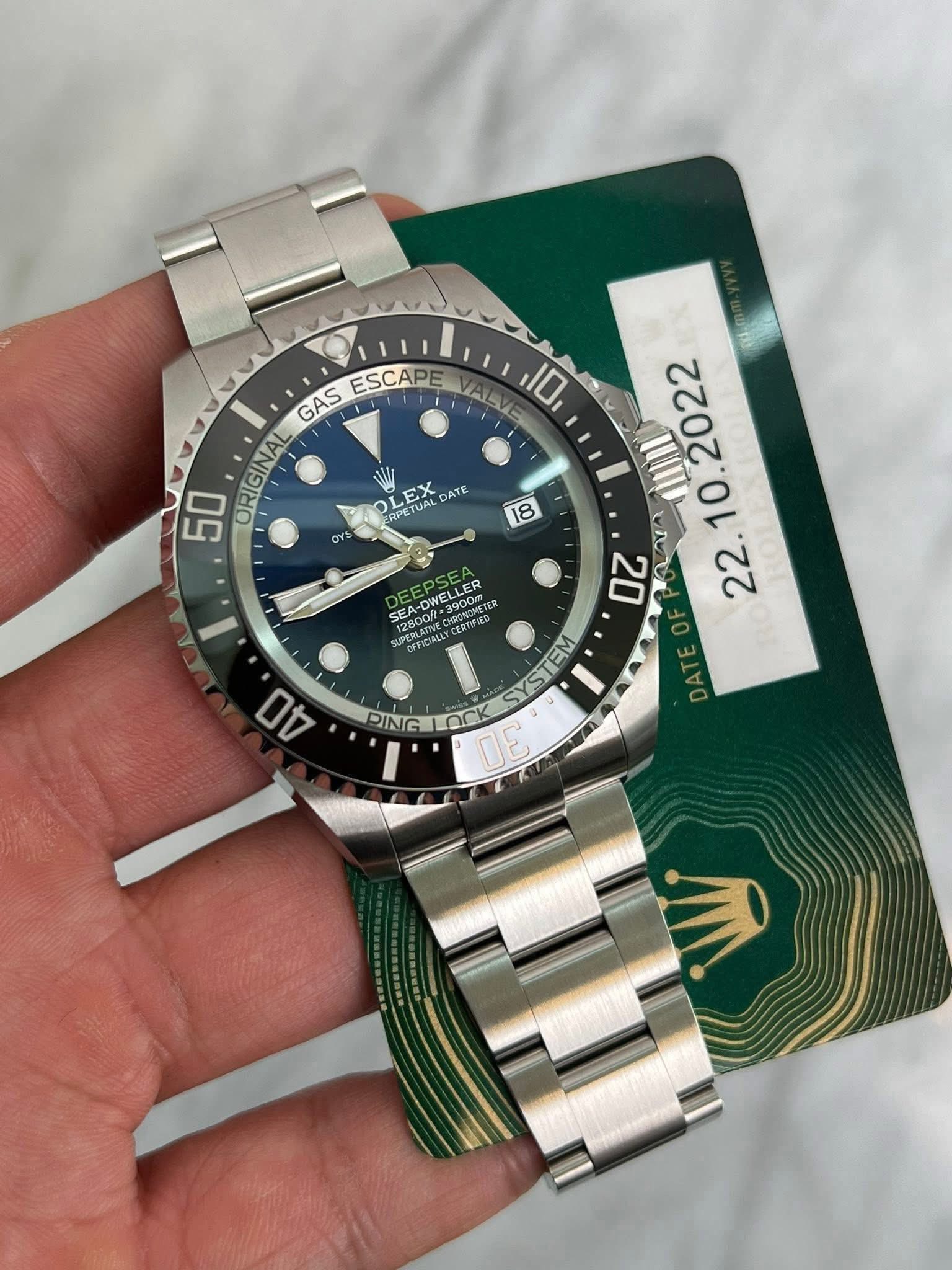 May be an image of wrist watch and text that says '10 ESCAPE GAS 50 ORIGINAL LEX EX DATE ERPETUAL RPE ors 18 M EEPSEA DWELLER -DWELL ELLER 3900m HapacиcTeo SEA DWE SEA 3900m .oTиe…