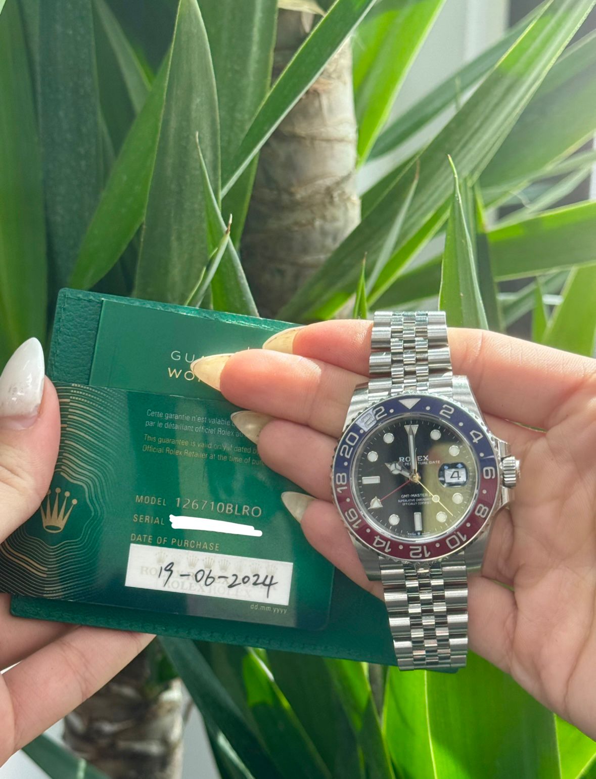 May be an image of wrist watch and text