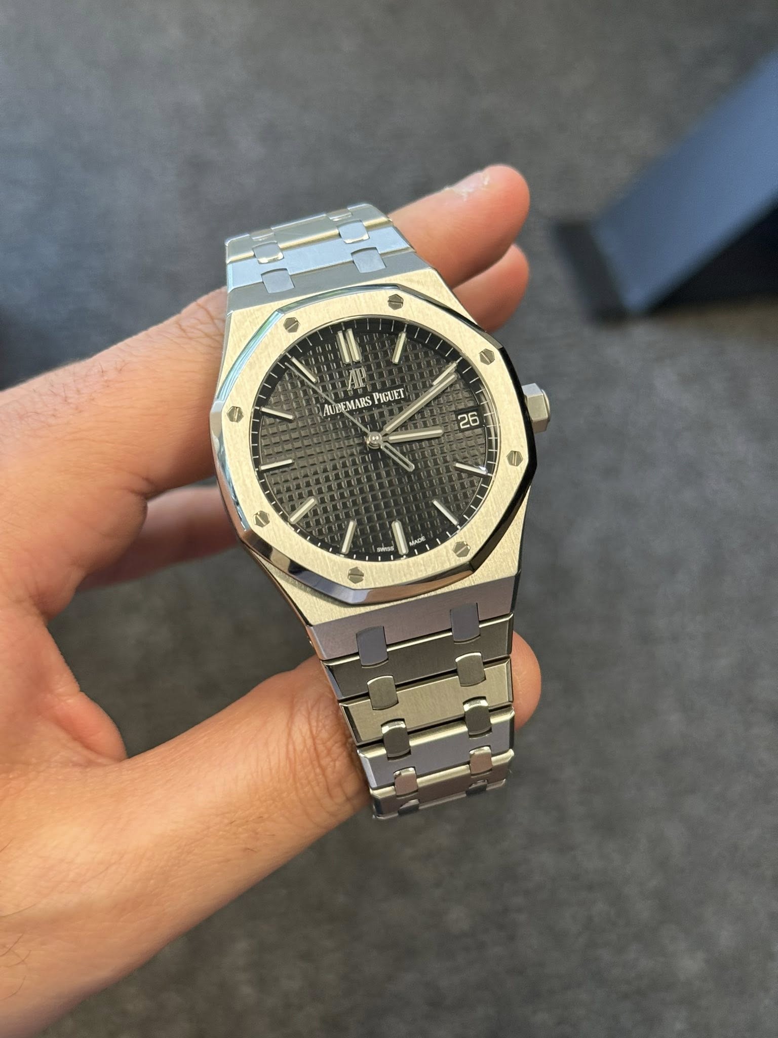 May be an image of wrist watch and text