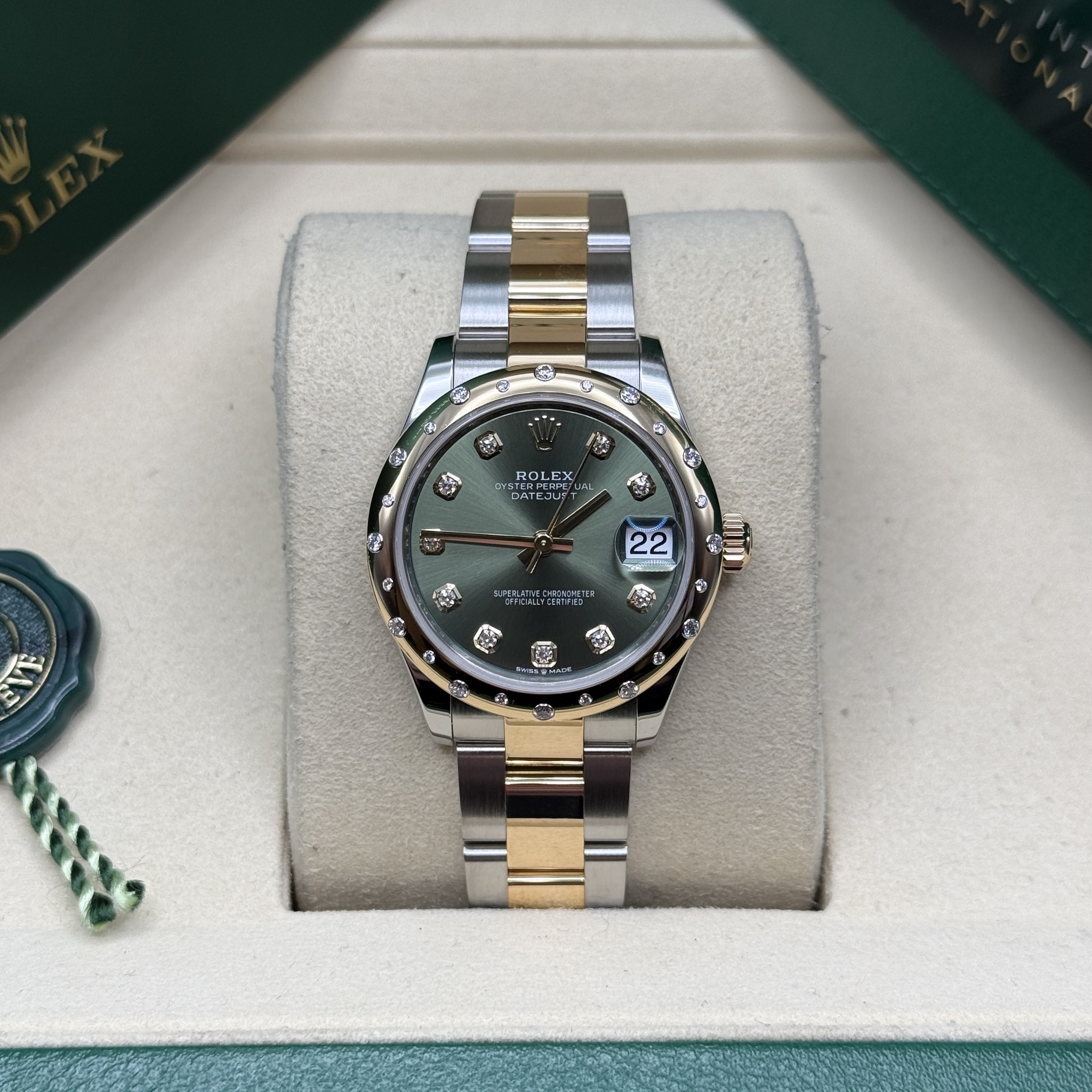 May be an image of wrist watch and text