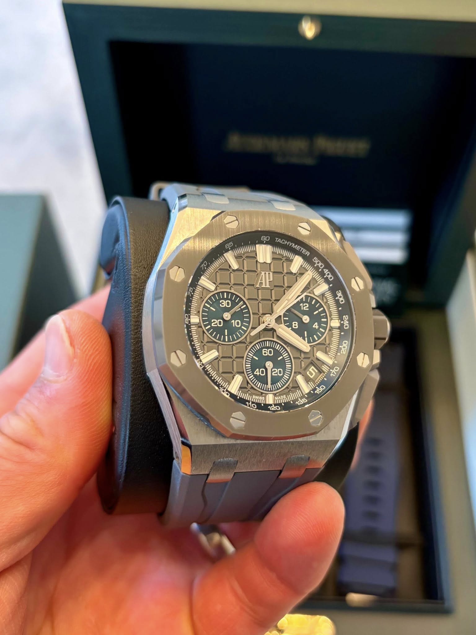 May be an image of wrist watch and text