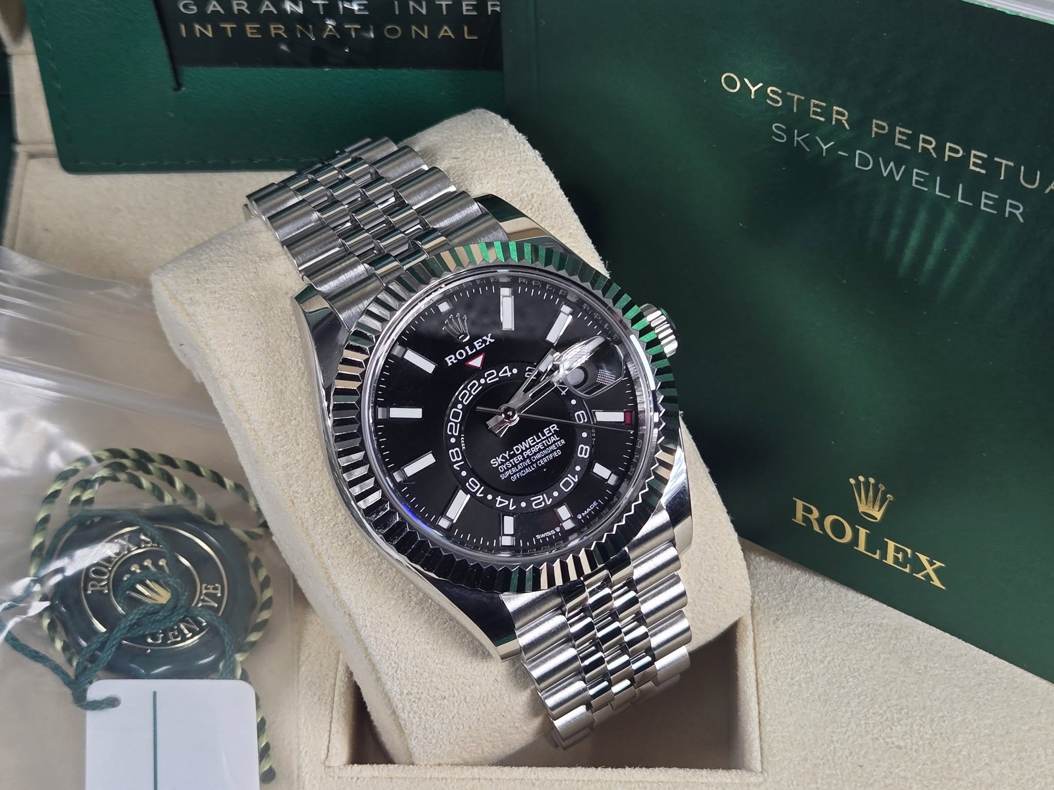 May be an image of wrist watch and text