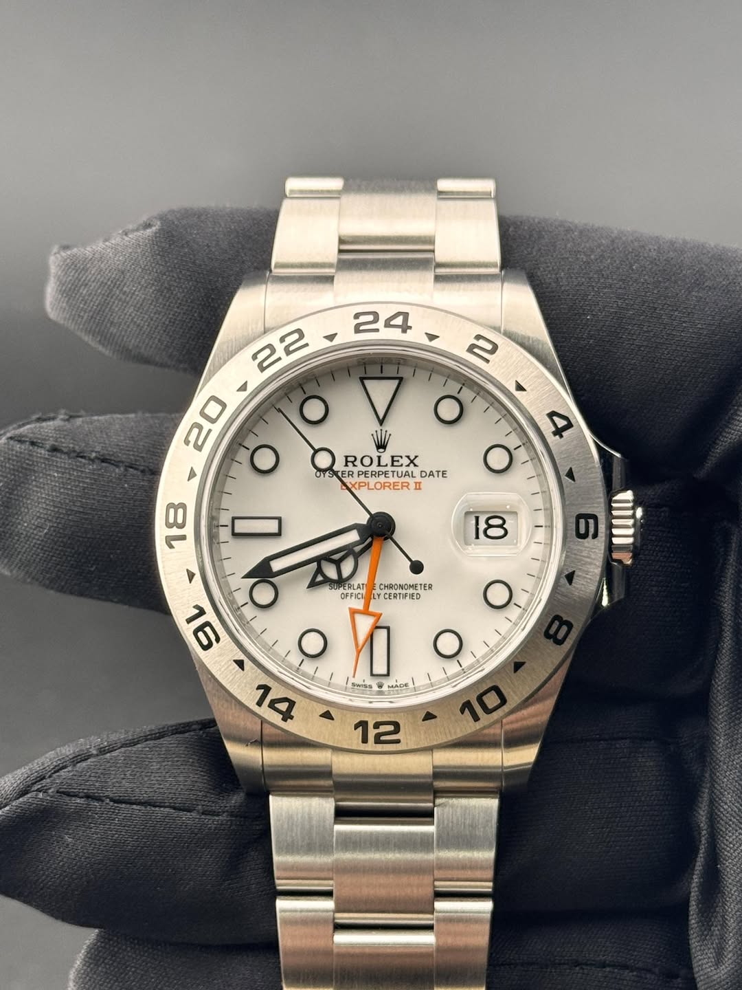 May be an image of wrist watch and text that says ' O 4 O O ROLEX ROL LEX OYSKE SKERPERPETUAL DATE XPLORERII SKERPERPETUALDATE n 18 18 αϊαι P O SUPERLAT TEL CHRONOMET TER…