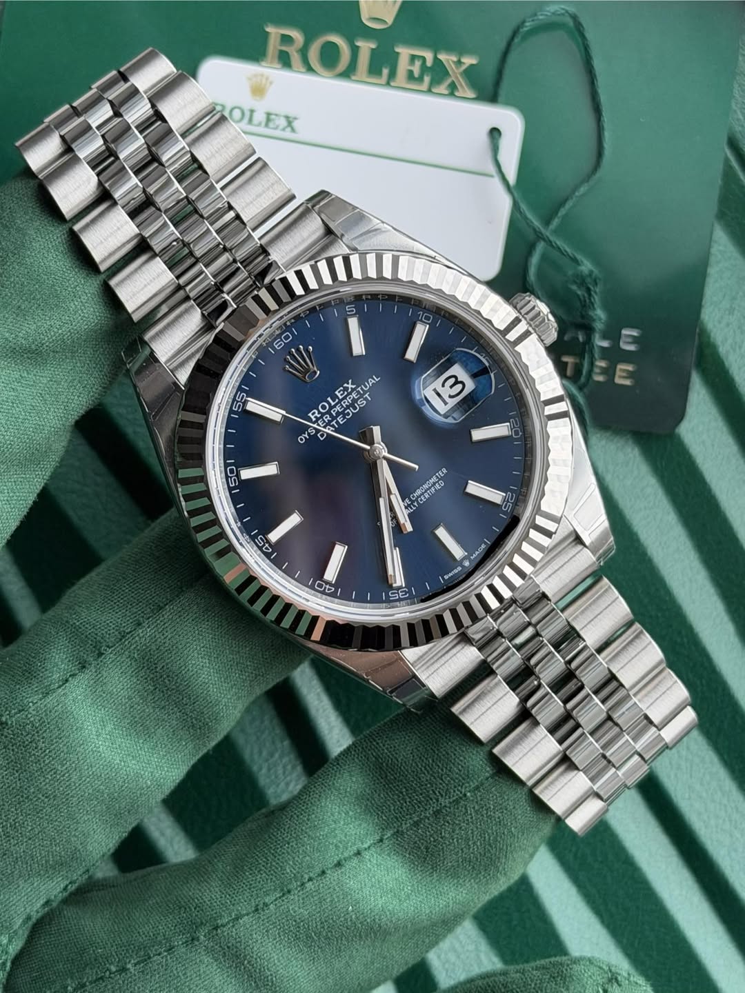 May be an image of wrist watch and text that says 'ROLEX ROLEX OLEX 5 60 55 ROI OLEX JUS 6T MP RPERPE CUST EX UAL DY AER 3 m ጣጣ 50 20 CHOGRONETE CERTIFIED 45 4- 5 の Ob ስ 6 O 용 E ቦ'