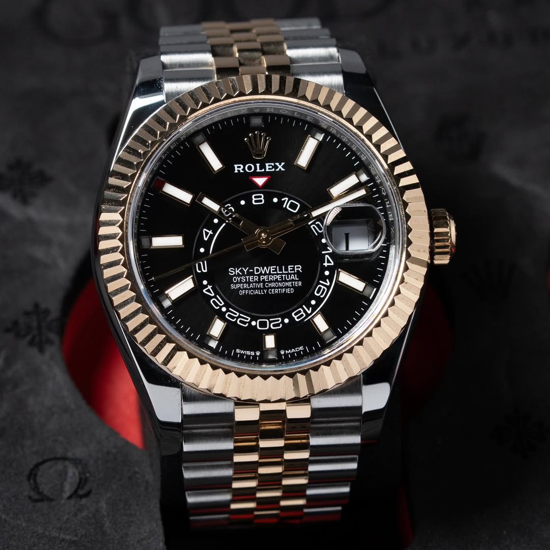 May be an image of wrist watch and text