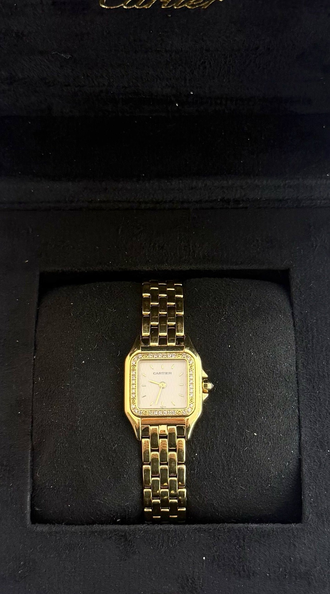 May be an image of digital watch and text that says 'CARTIEN 5'
