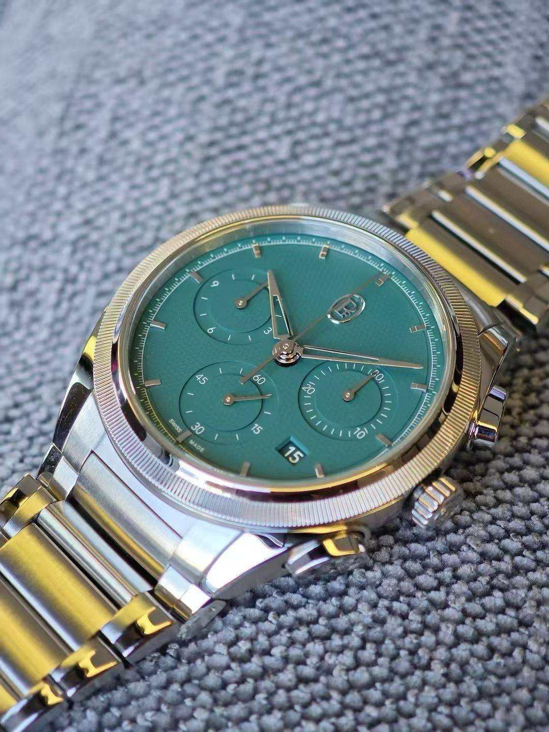 May be an image of wrist watch and text
