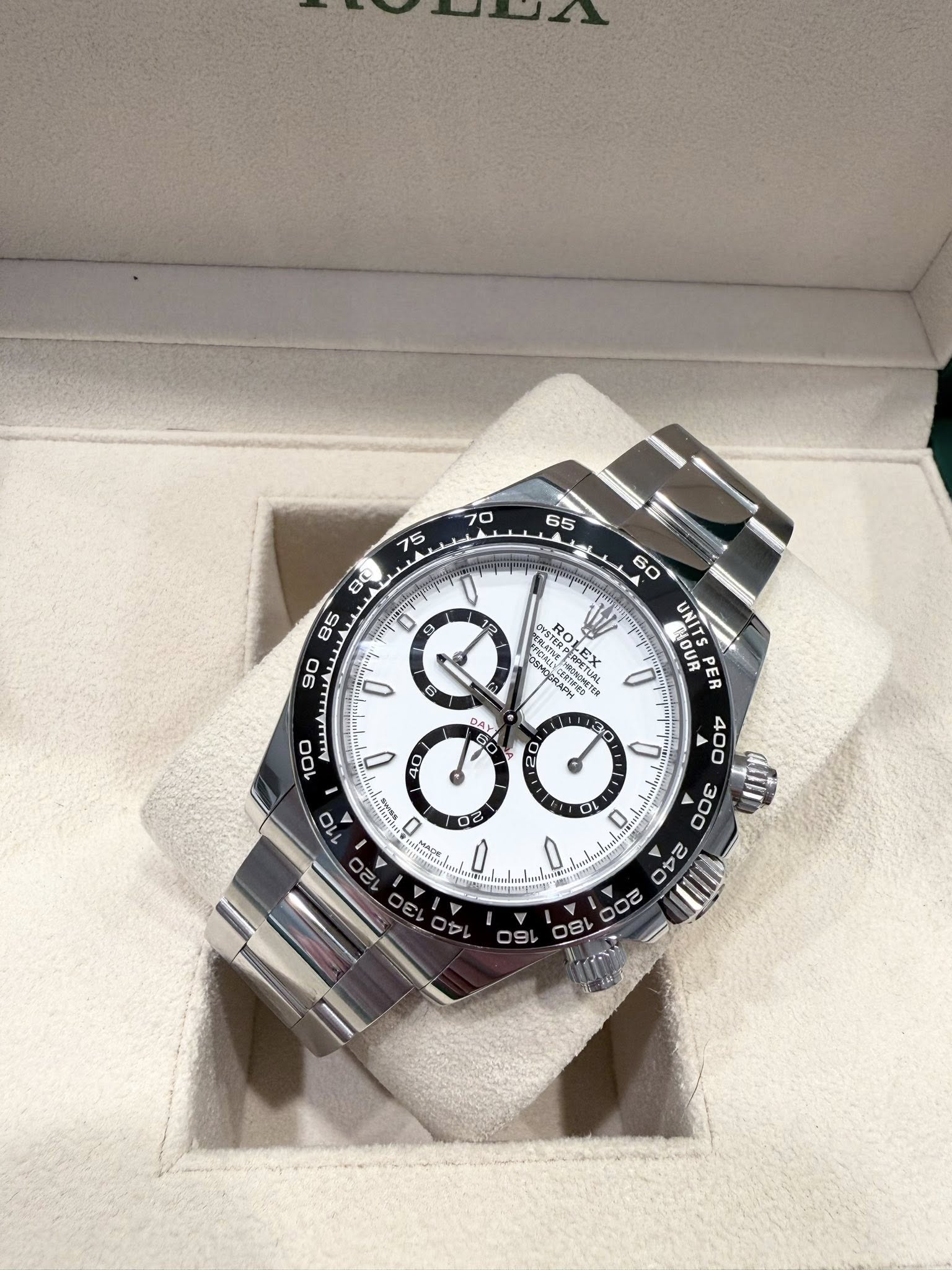 May be an image of wrist watch and text