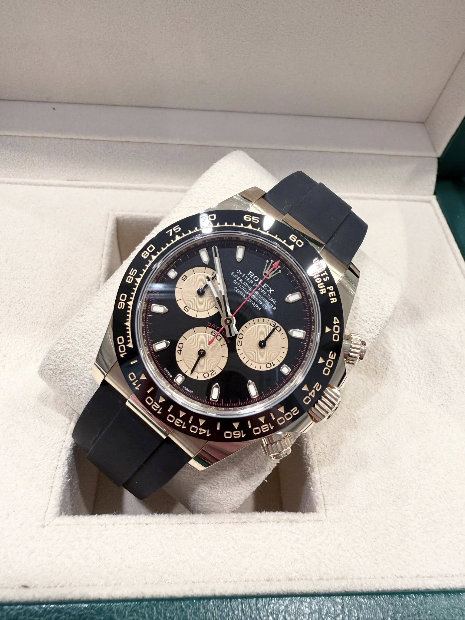 May be an image of wrist watch and text