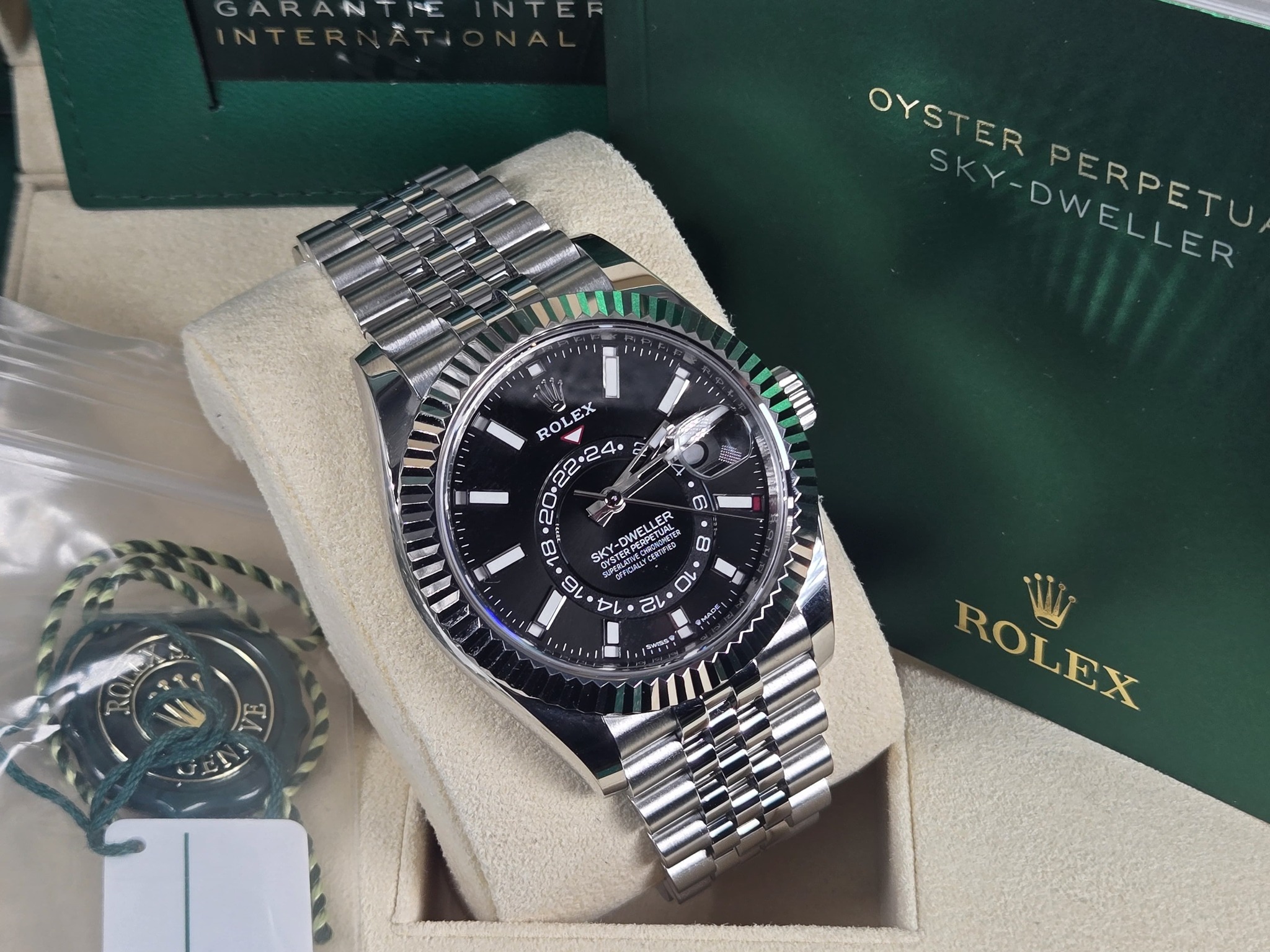 May be an image of wrist watch and text