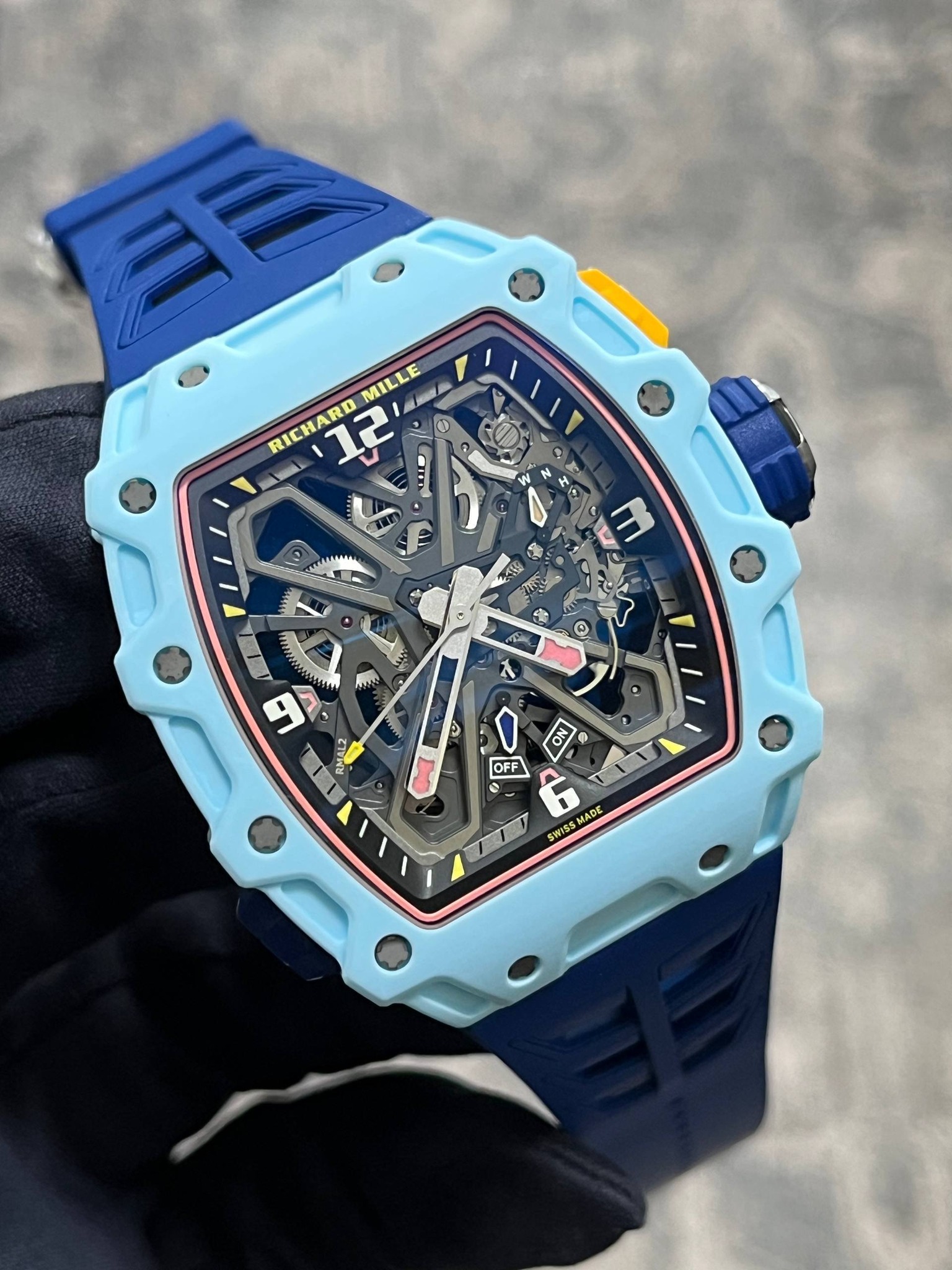 May be an image of wrist watch and text that says 'MILLE RICHARD 12 + ٥ A S ن 福 KIE m O 2 M4S K 1 I ኢስዲዮ WIT L RMAL2 MAL2 A ON OFF ひー SWISS SWISSMADE MAO MADE'