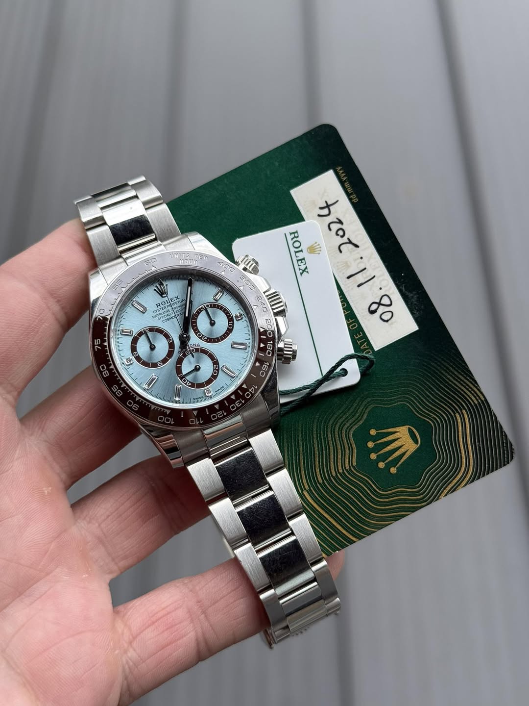 May be an image of wrist watch and text