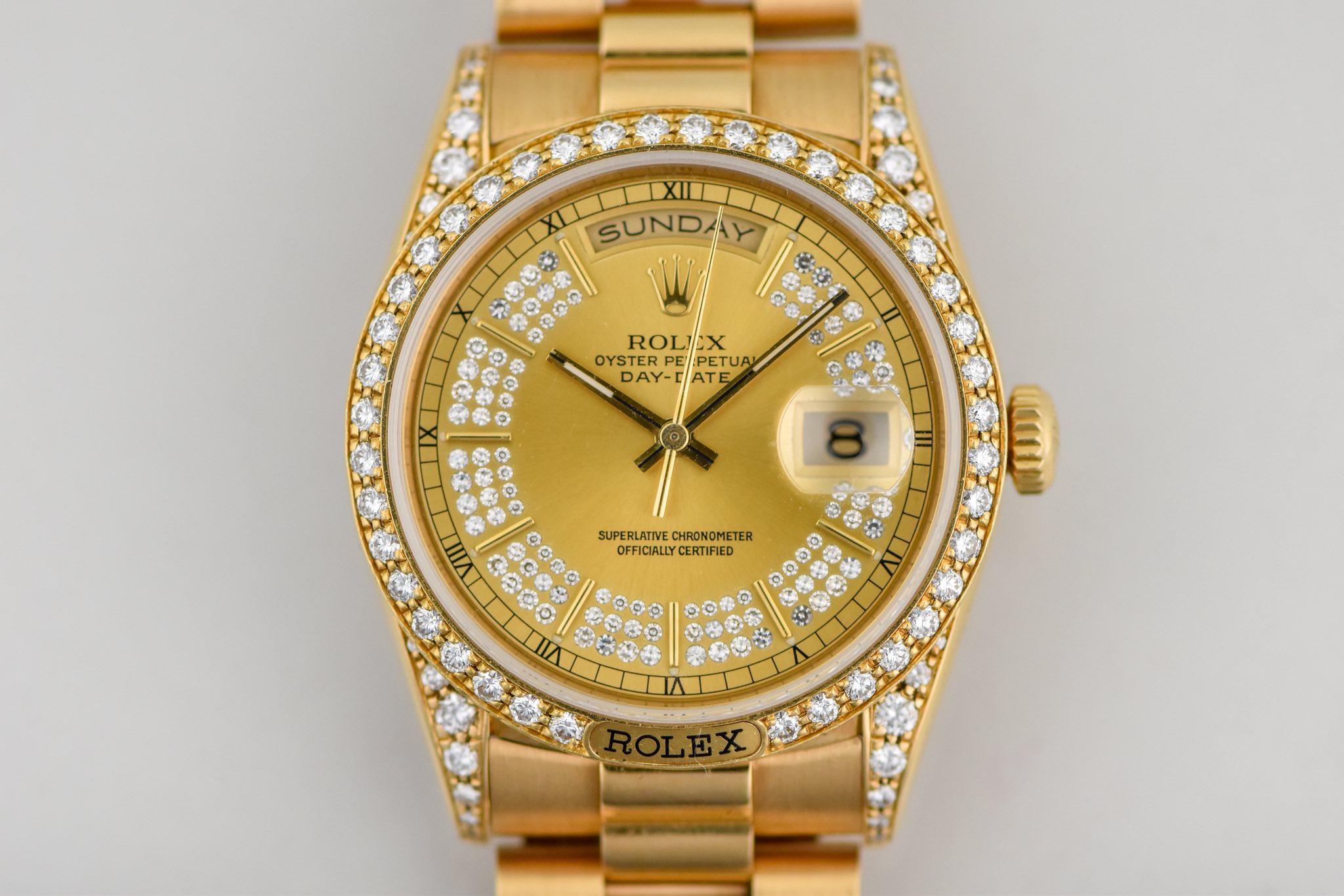 May be an image of wrist watch and text
