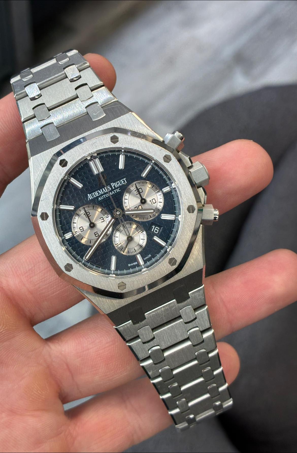 May be an image of wrist watch and text