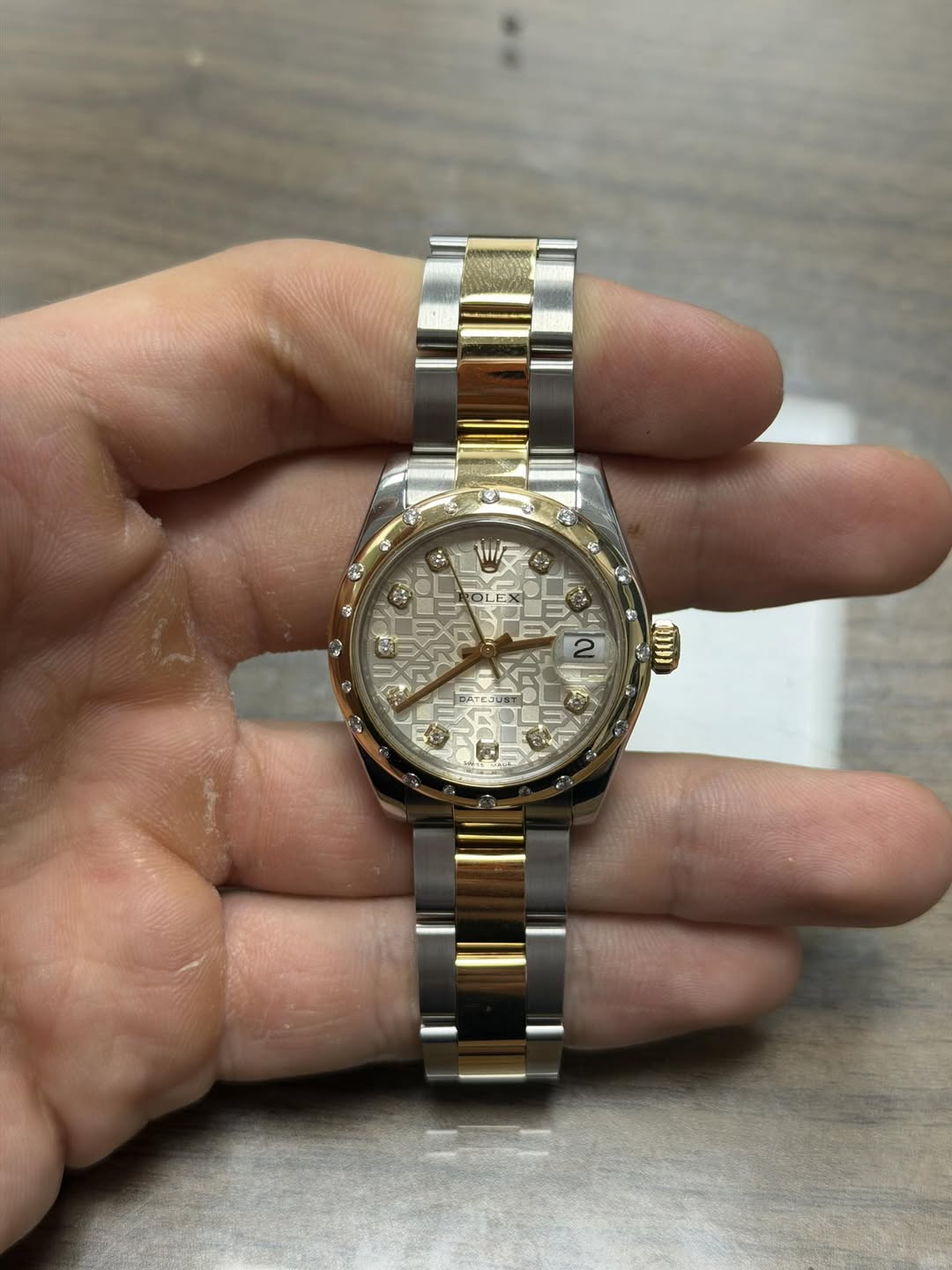 May be an image of wrist watch