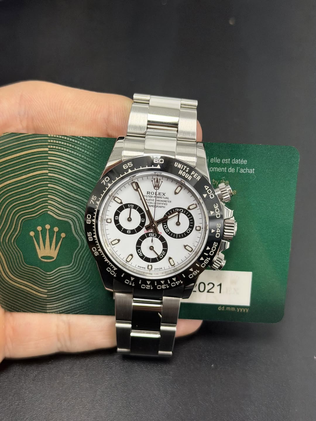May be an image of wrist watch and text