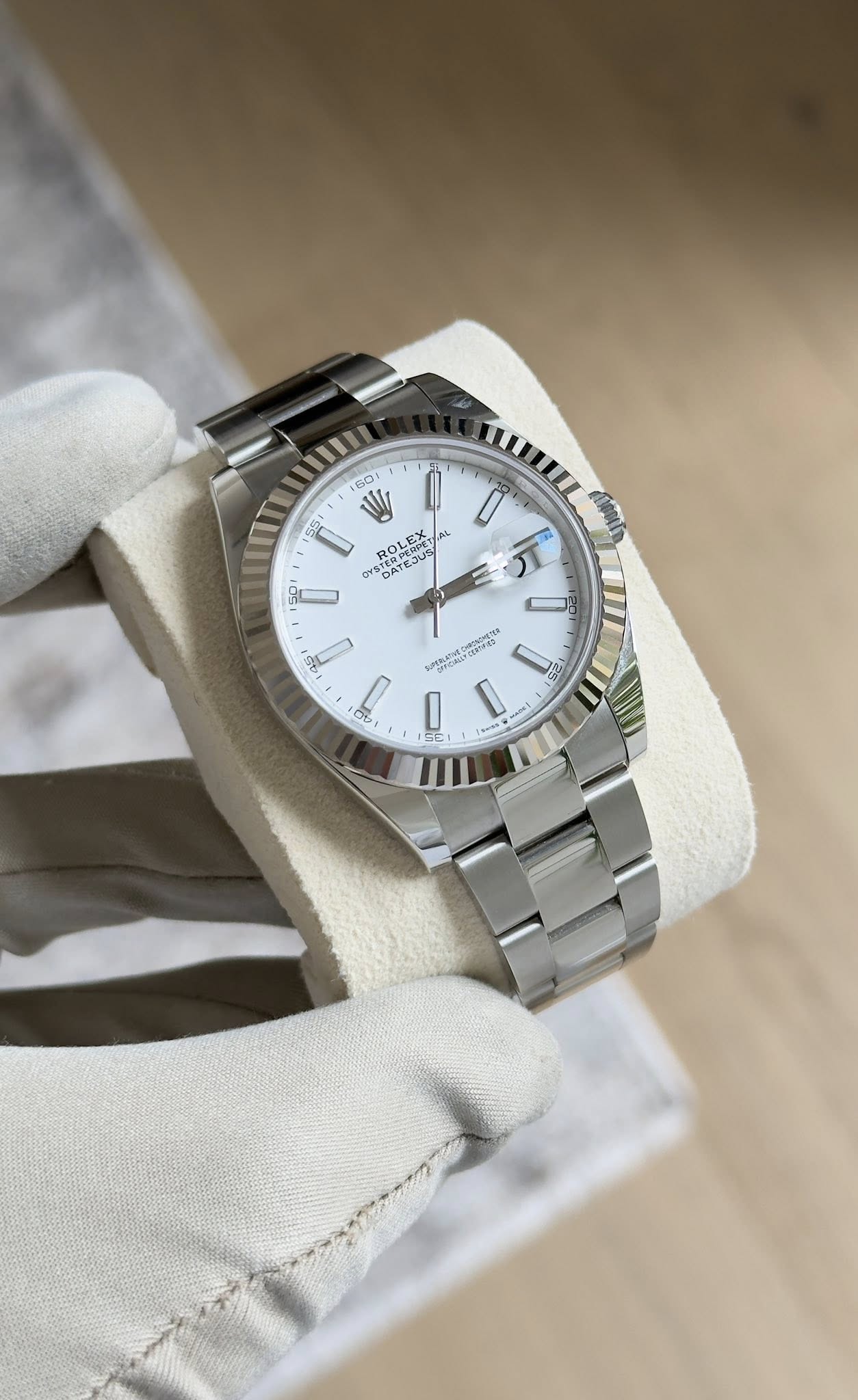 May be an image of wrist watch and text