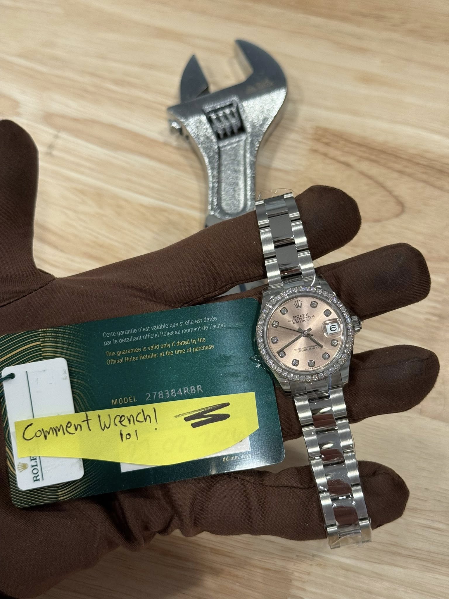 May be an image of wrist watch and text