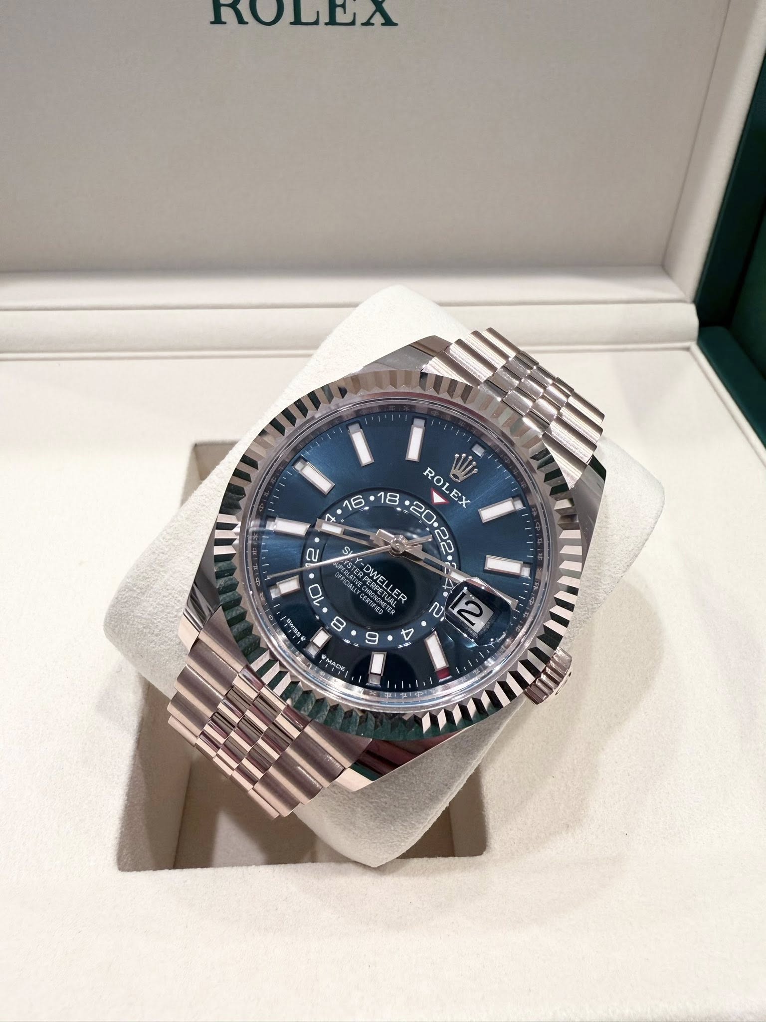May be an image of wrist watch and text
