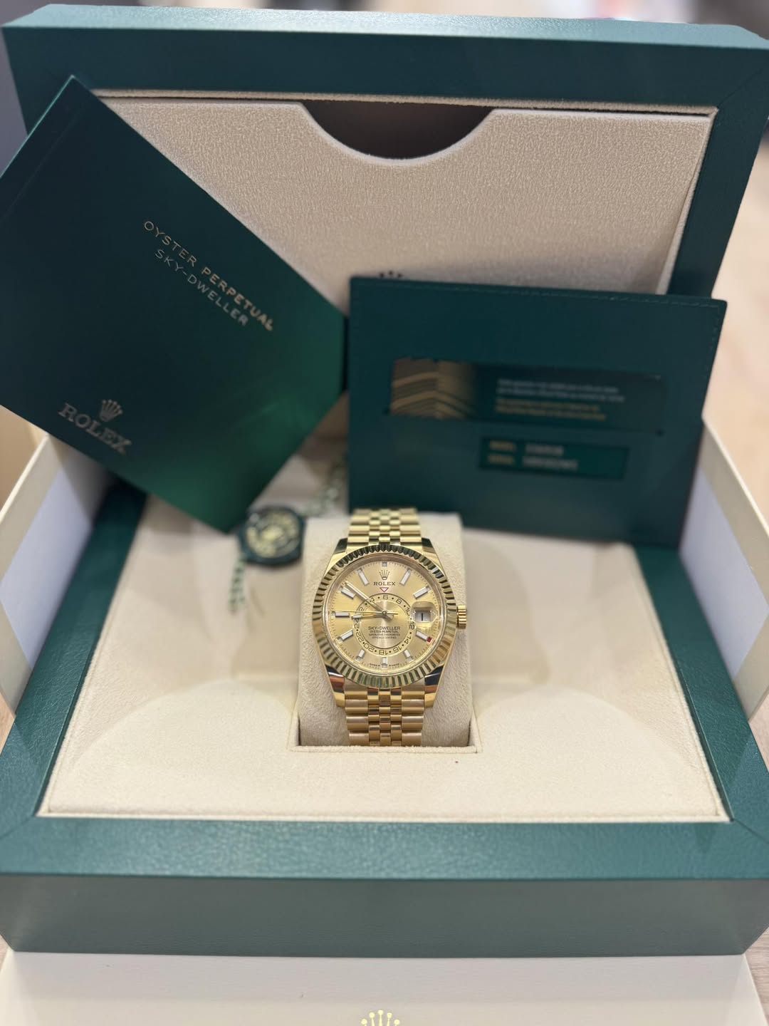 May be an image of wrist watch and text