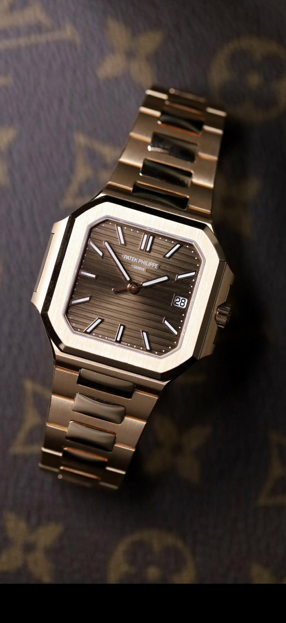 May be an image of wrist watch and text