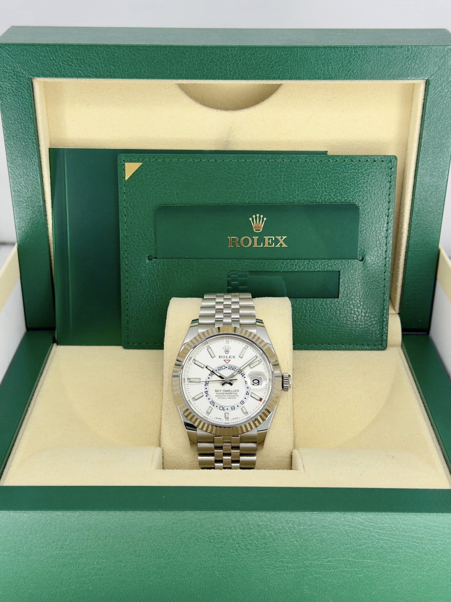 May be an image of wrist watch and text