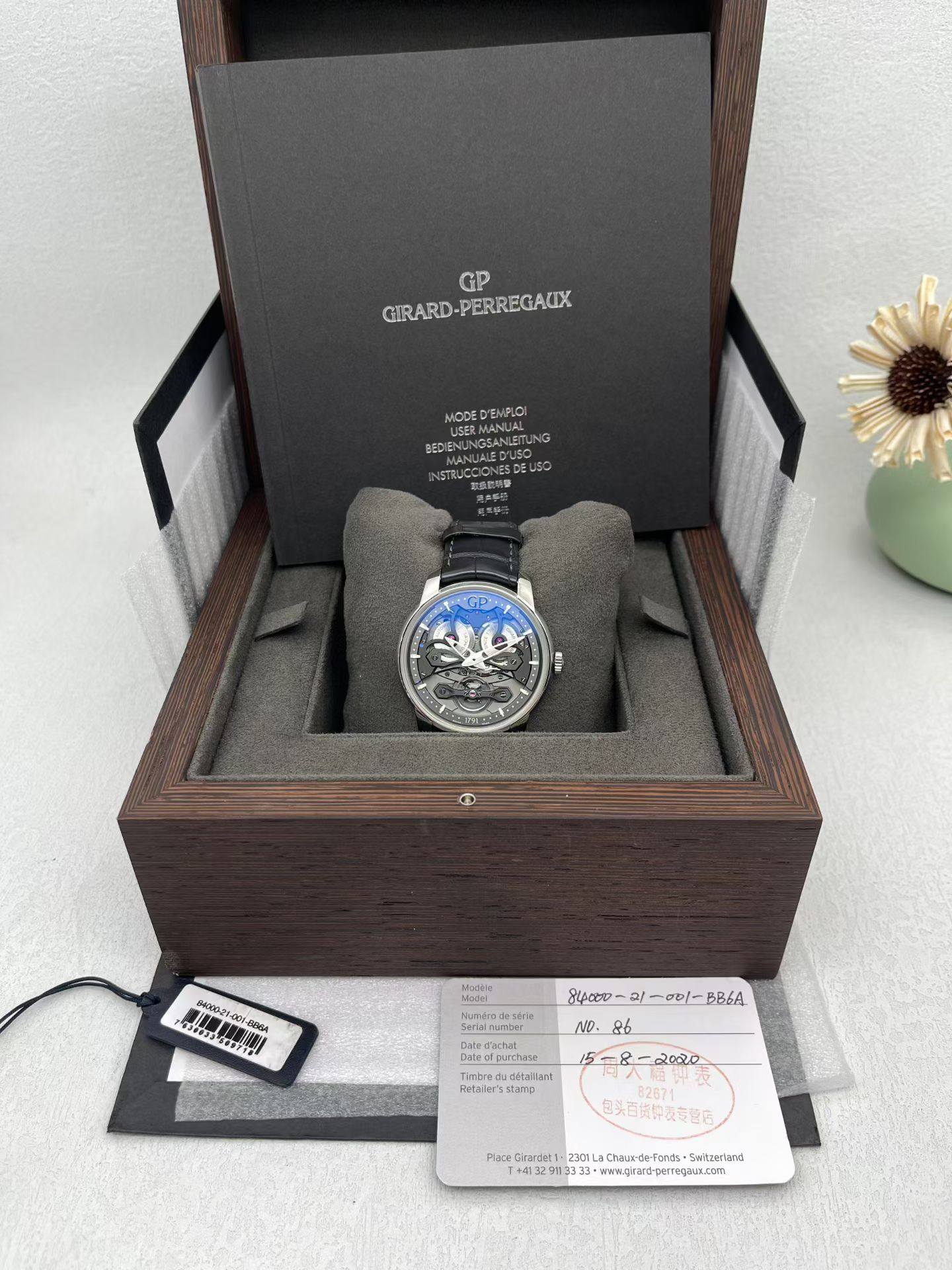 May be an image of digital watch, phone and text