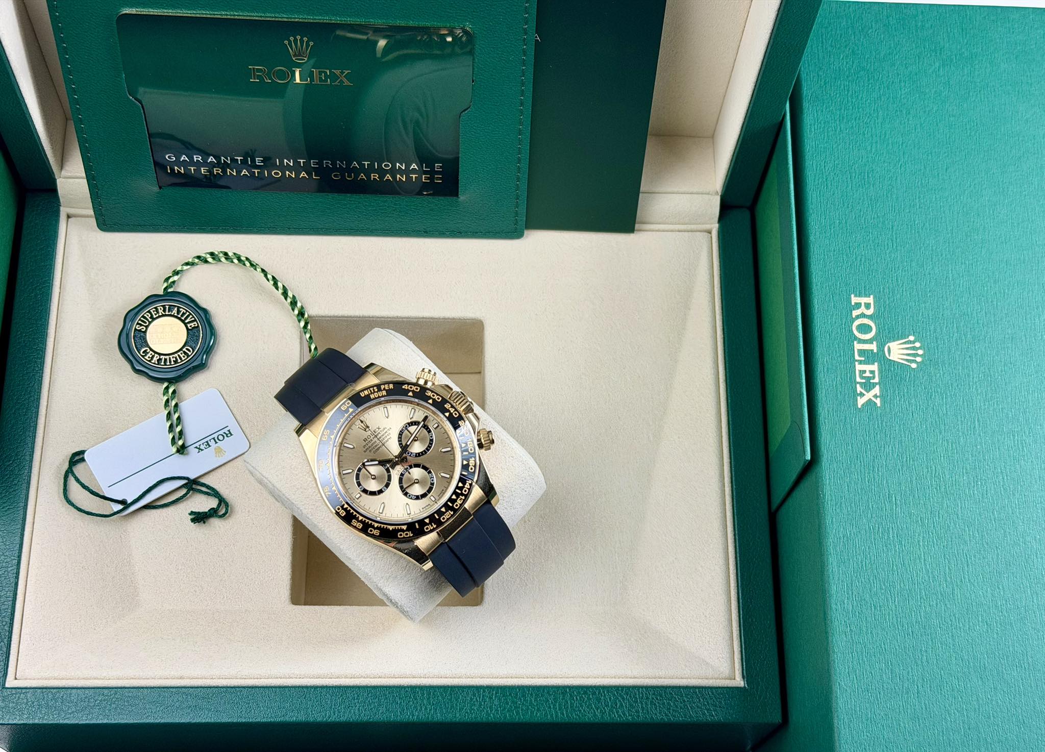 May be an image of wrist watch and text that says 'GARANTIE INT INTERNATIONAL GARANTIEINTERNATIONAL INTERNATIC ATIONA RANTEE SUPERLATTE CERTIFIED นาวย ToL B4α 00,نة 150 240…