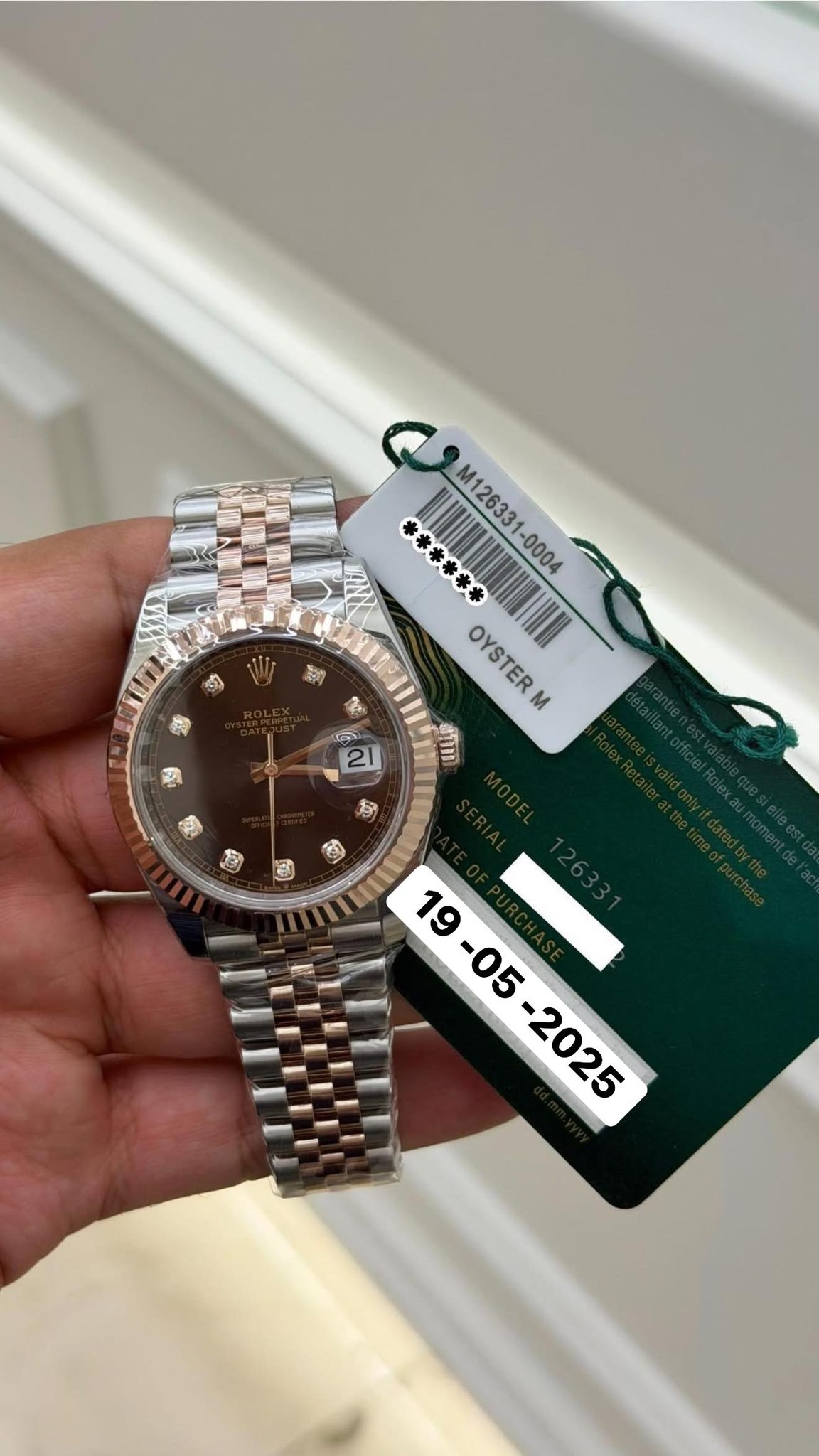 May be an image of wrist watch and text that says 'ជាំ 작영) ***本本米 M126331-0004 M12633 -0004 OYSTERM M สรรัา 機 春 ال 21 S a 網 '