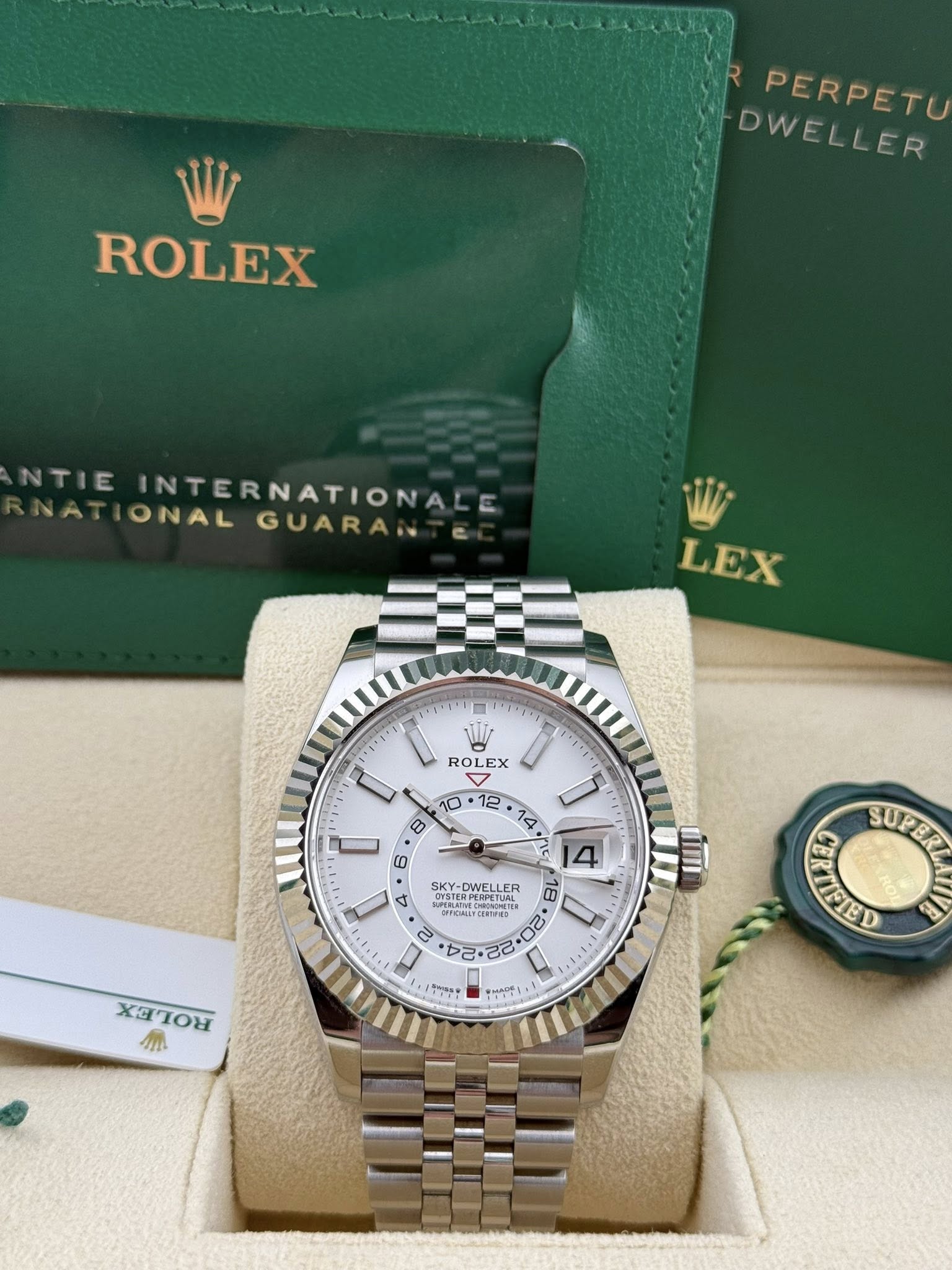 May be an image of wrist watch and text