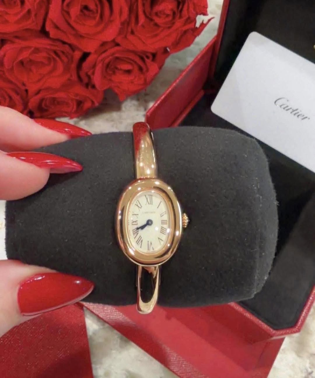 May be an image of wrist watch and text