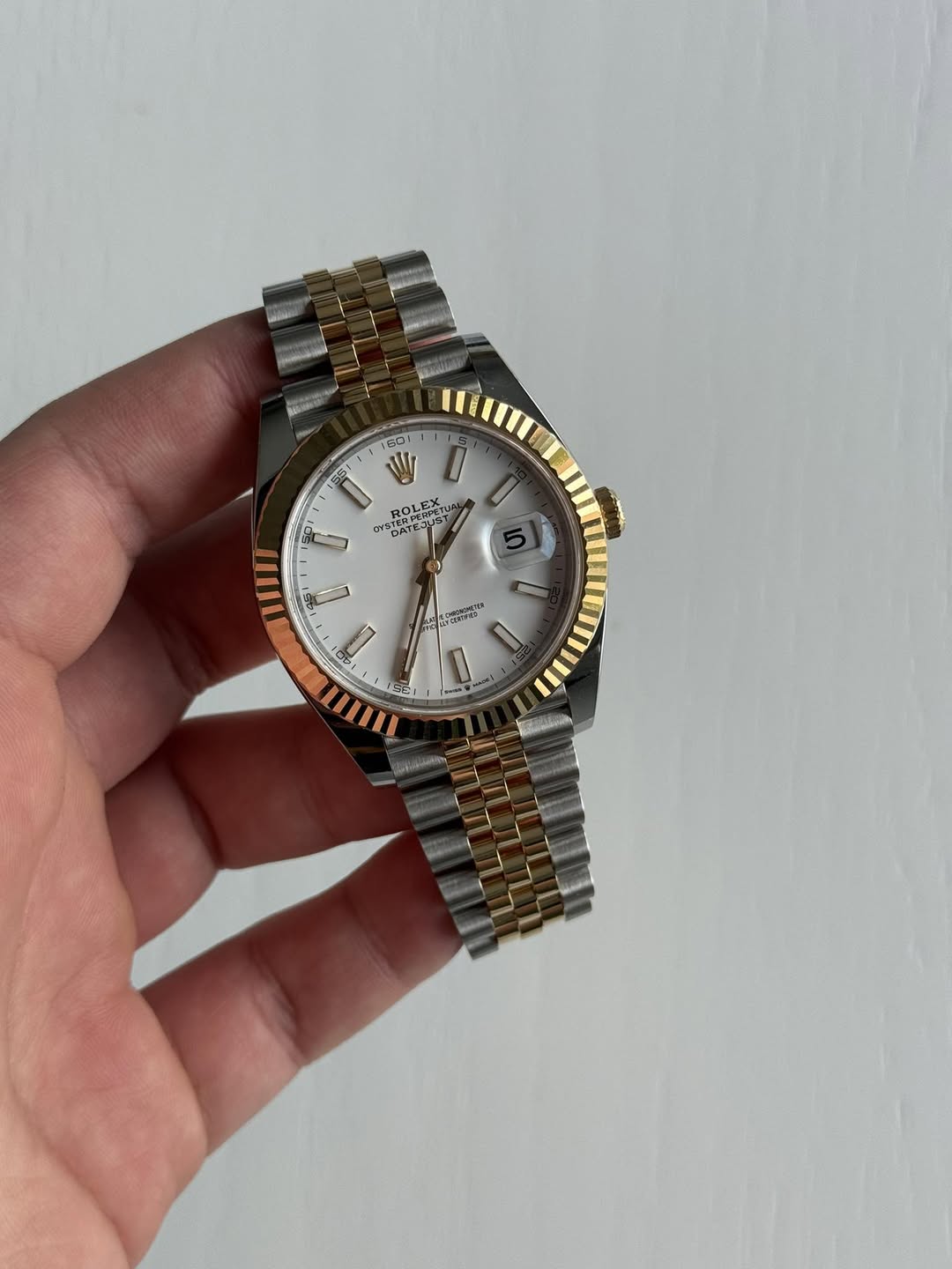 May be an image of wrist watch