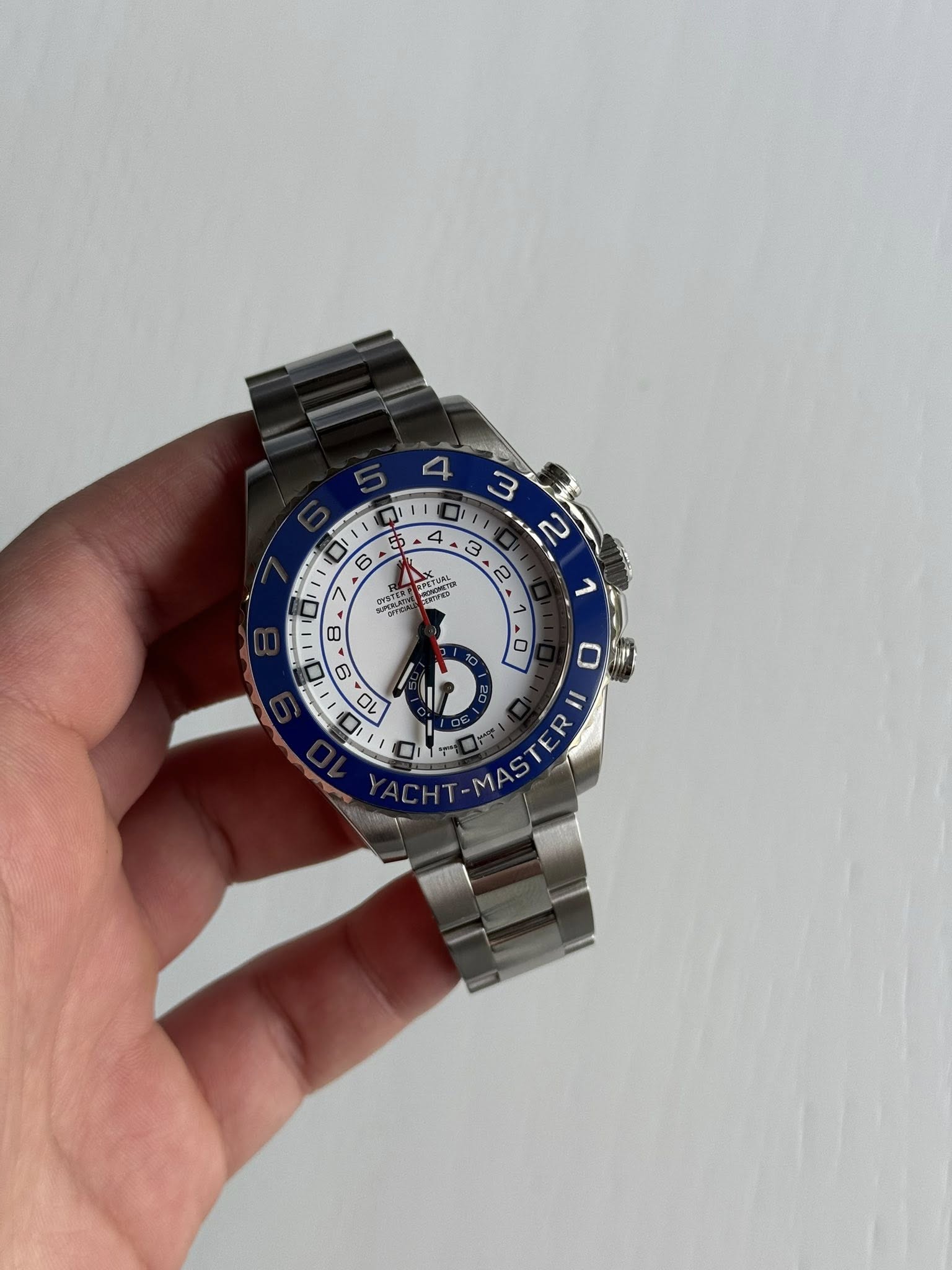 May be an image of wrist watch and text