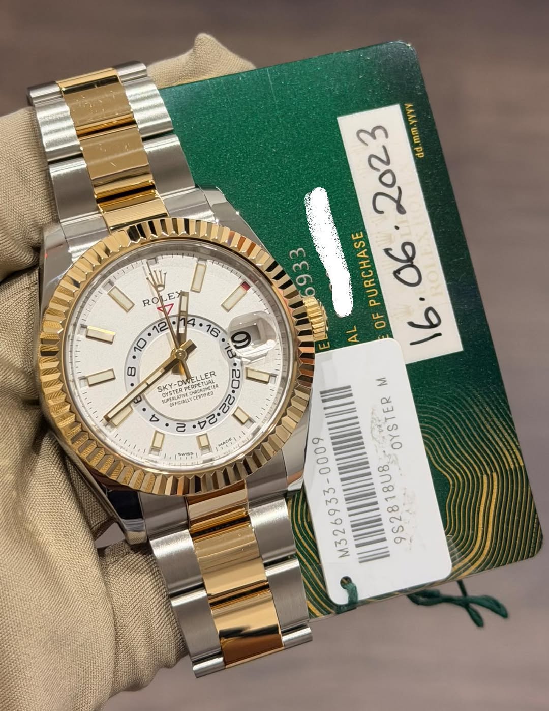 May be an image of wrist watch and text