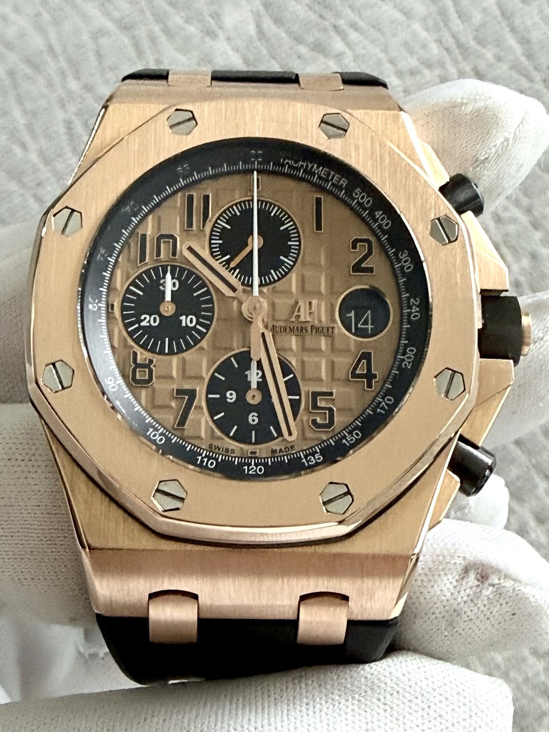 May be an image of wrist watch and text
