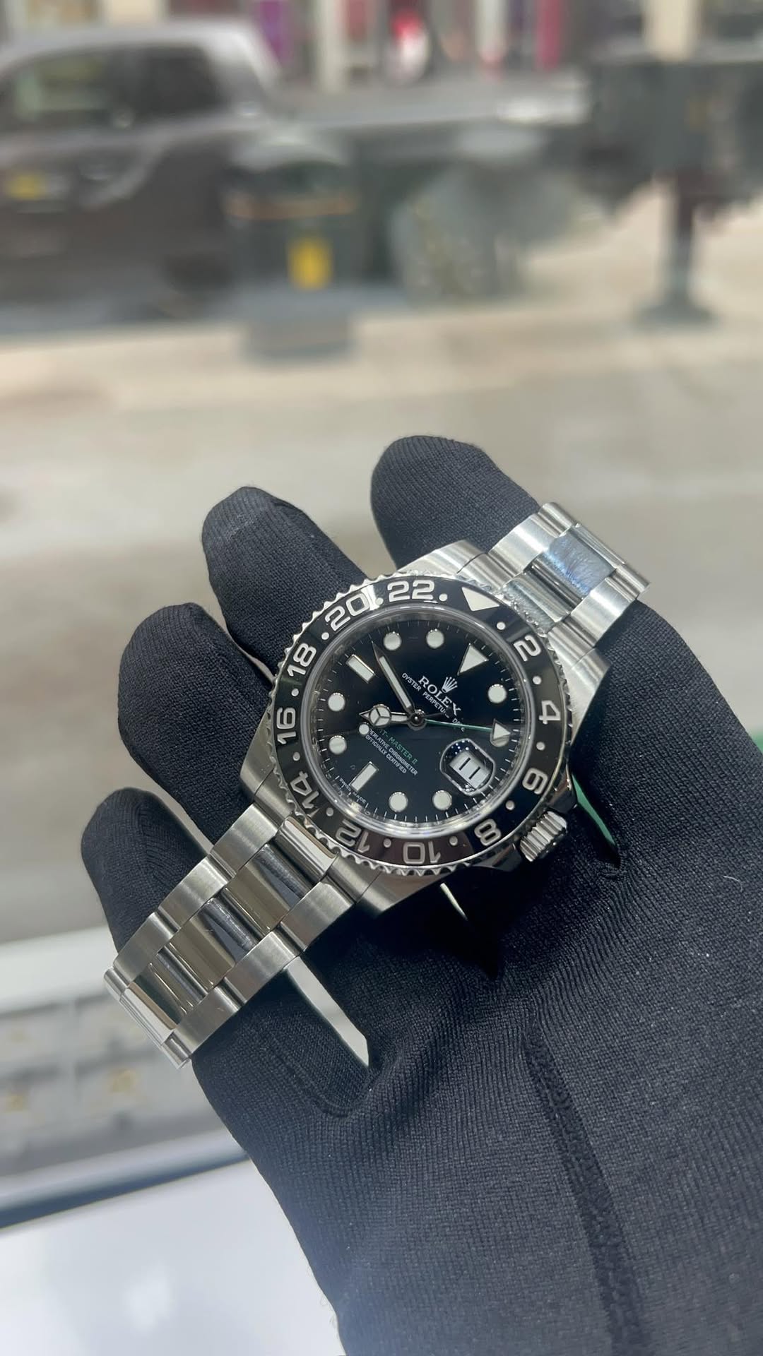 May be an image of wrist watch and text