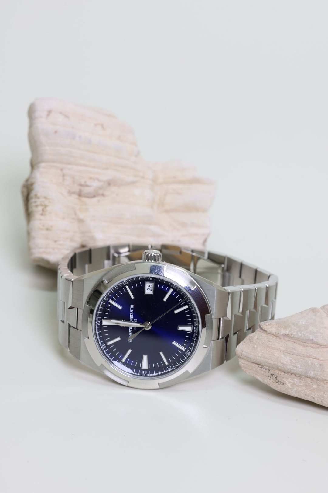 May be an image of wrist watch and text