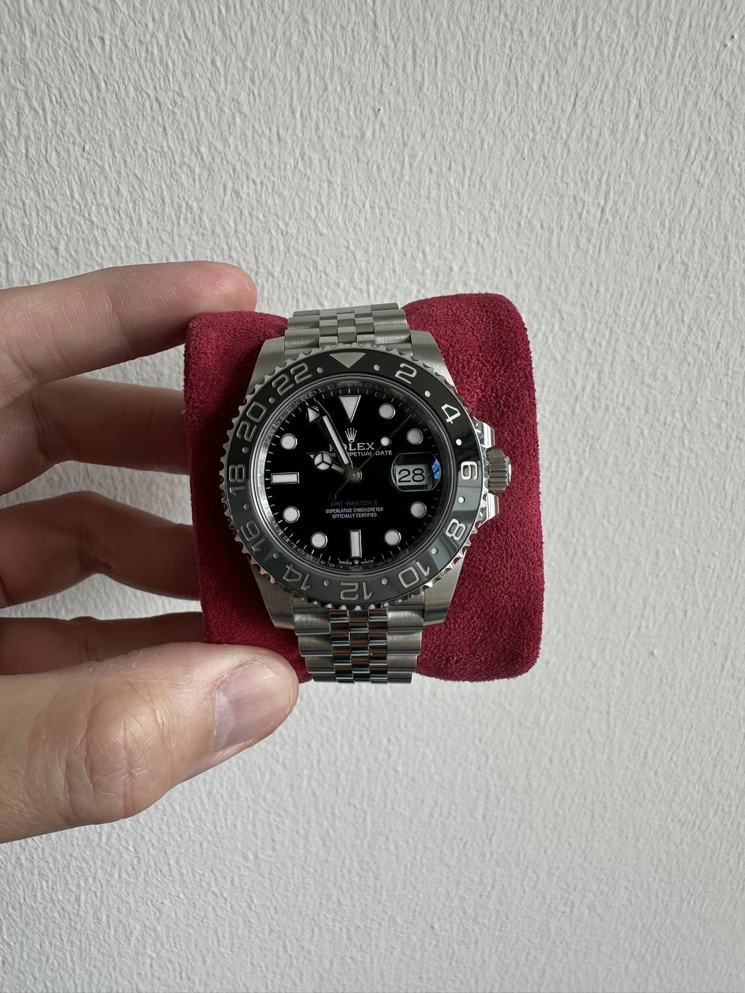 May be an image of wrist watch and text