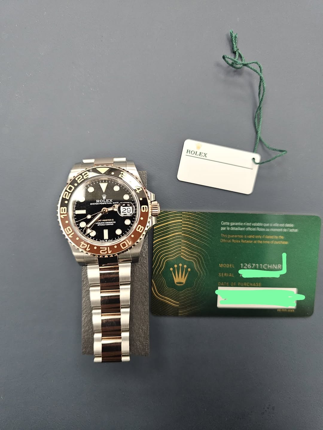 May be an image of wrist watch and text