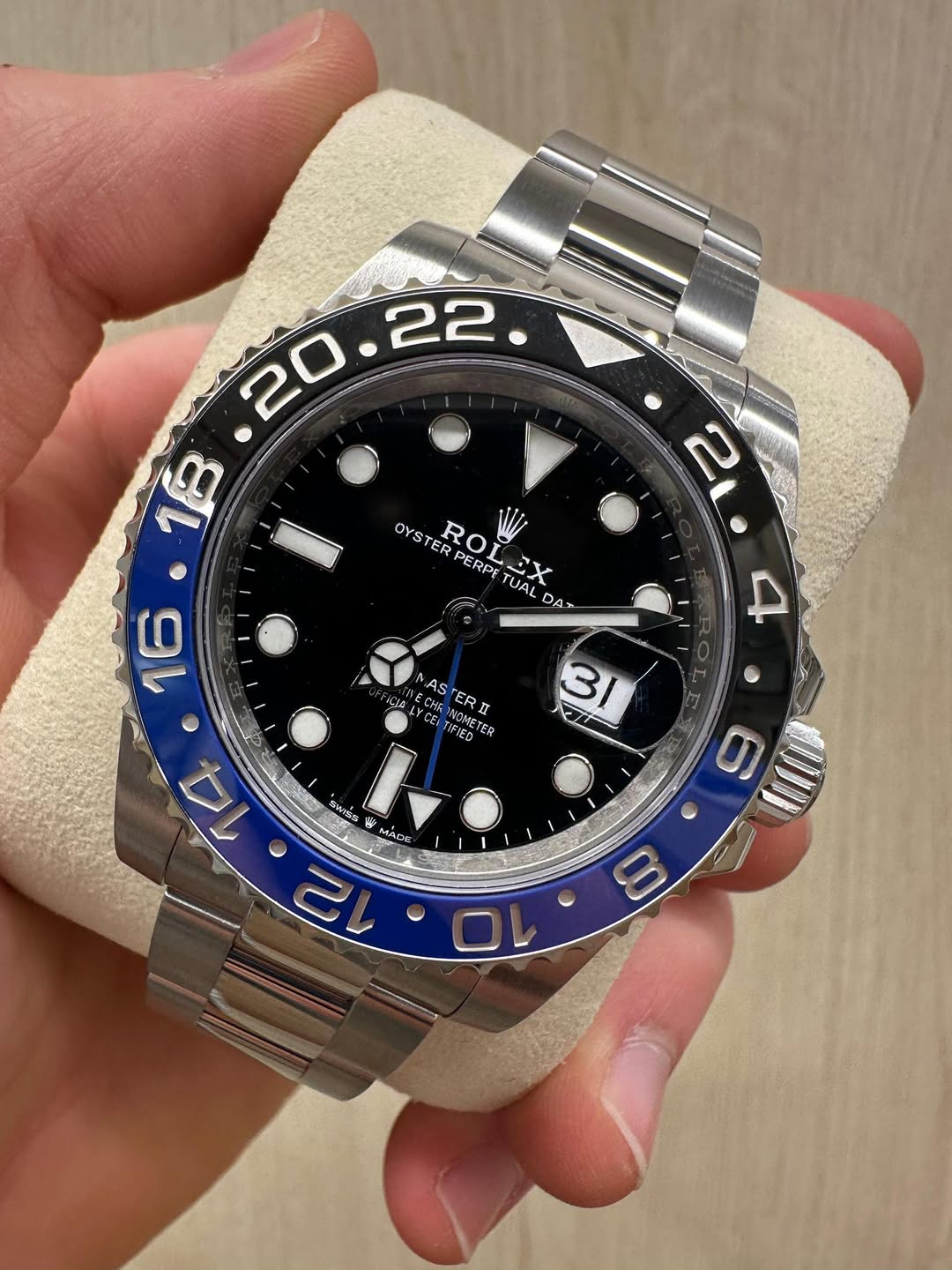 May be an image of wrist watch and text