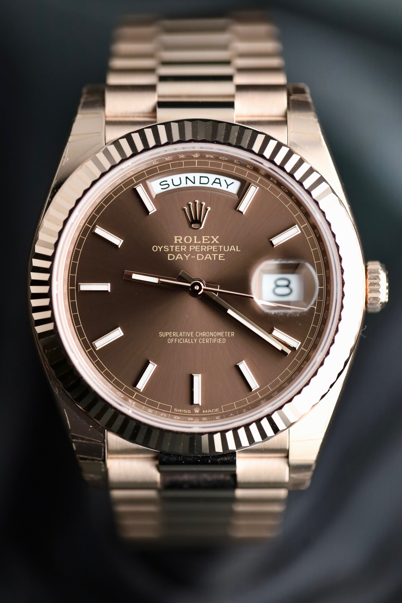 May be an image of wrist watch and text that says 'SUNDAY ROLEX OYSTER PERPETUAL DAY-DATE DATE J 8 SUPERLATIVE.CHROROMETER SUPERLATIVE CHRONOMETE ER ER CFFICIALLYCERTIFIED…