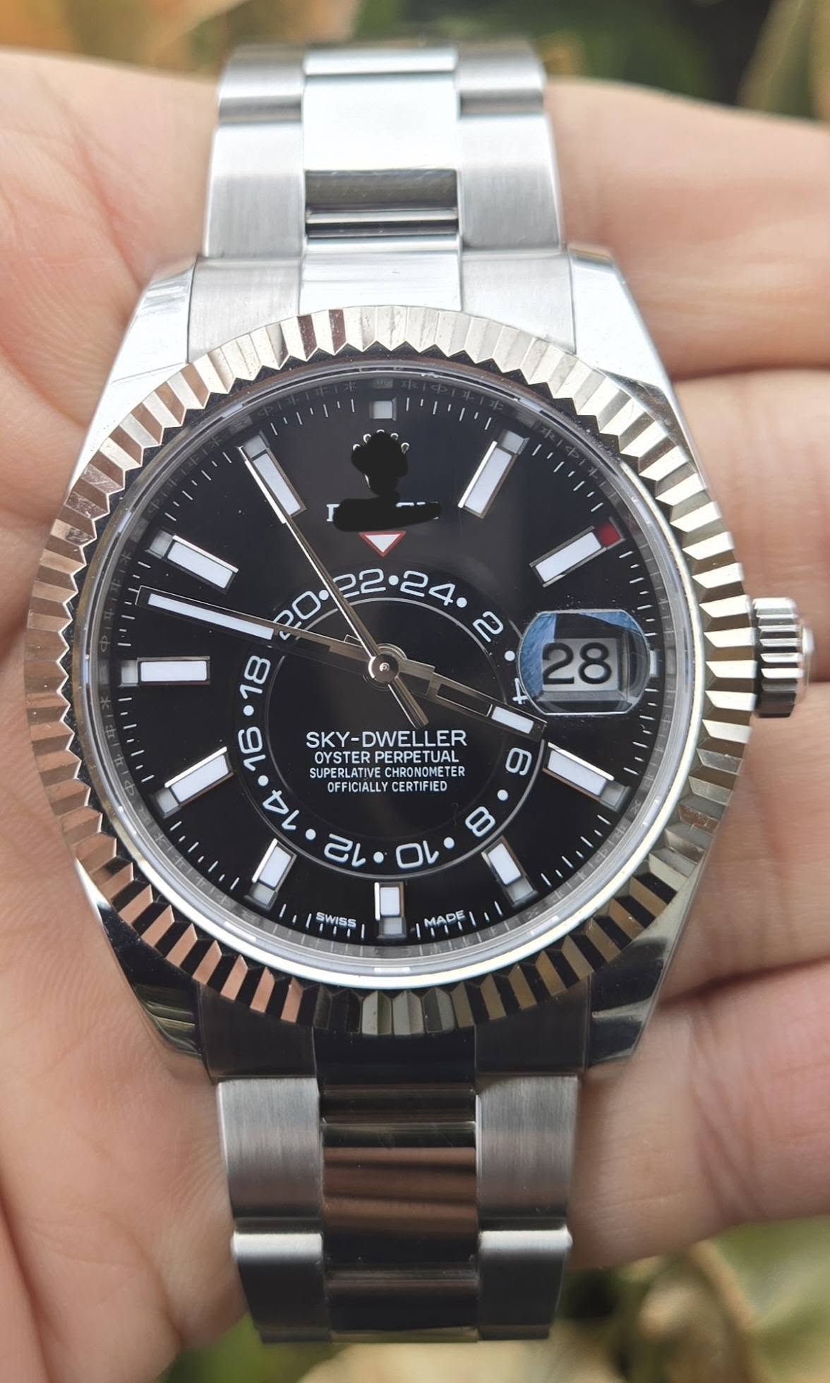 May be an image of wrist watch and text that says 'r . • SKY-DWELLER SKY- RPETUAL SUPERLATIE OYSTER SUPERL SUPERLATIVE CUPERLATIVE OYSTERPERPETUAL UPERLATIVECHRONOMETE HRONONETER…